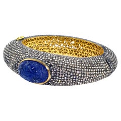 Brazalete de tanzanita tallada y diamantes pavé de oro de 14k y plata