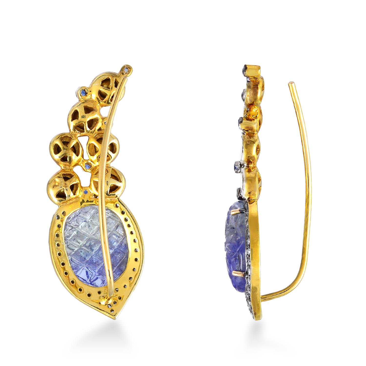 These ear climbers are handmade in 18-karat gold and sterling silver.  It is beautifully detailed with 10.6 carats tanzanite, .20 carats sapphire & 2.1 carats of sparkling diamonds. Show off their unique style by sweeping your hair back.

FOLLOW 