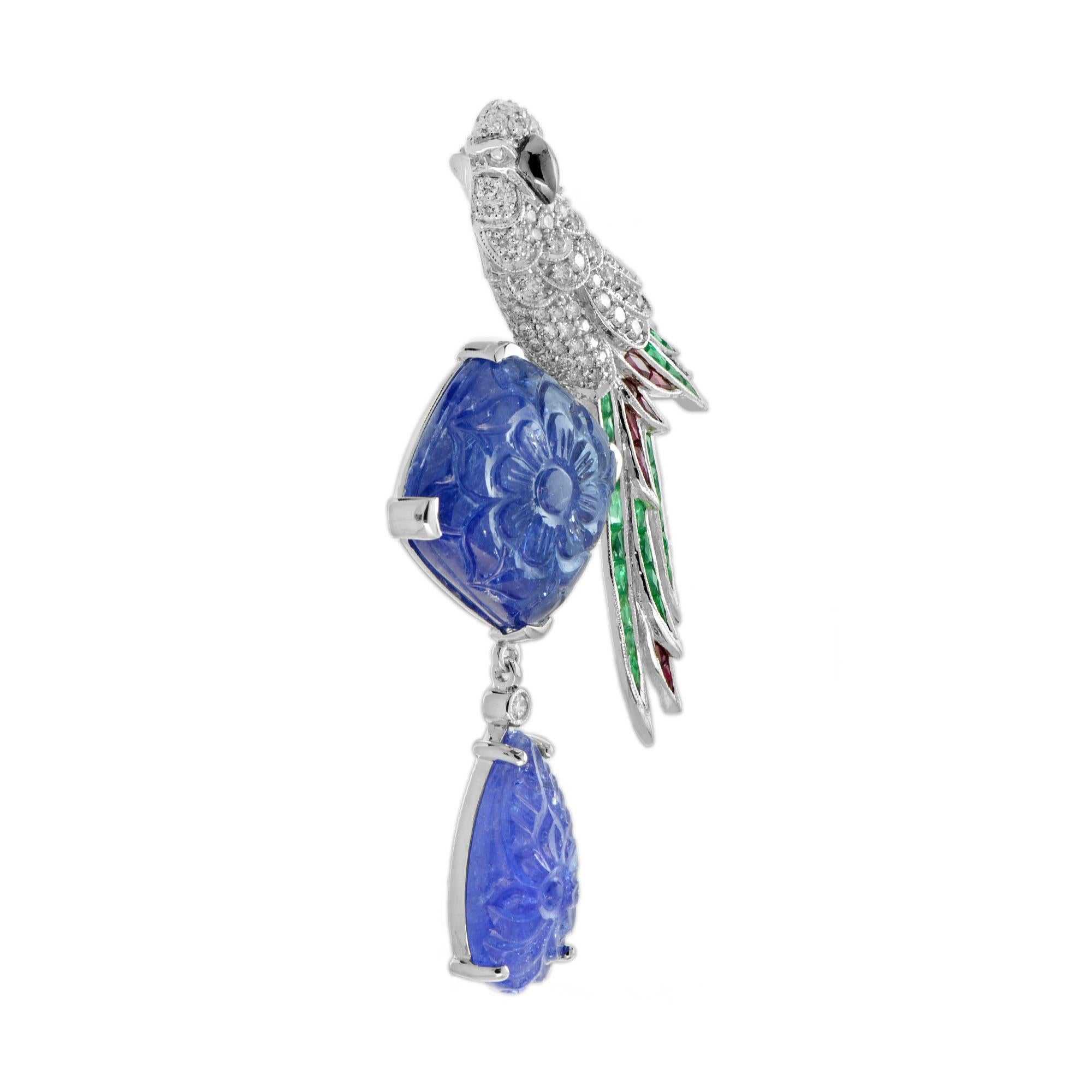 he bird brooch modeled in the form of a parrot perch upon a bloom. The highlight blooming flower formed by carved octagon and drop shaped tanzanite. The head and body features glittering sixty-one H color SI clarity diamonds while French cut