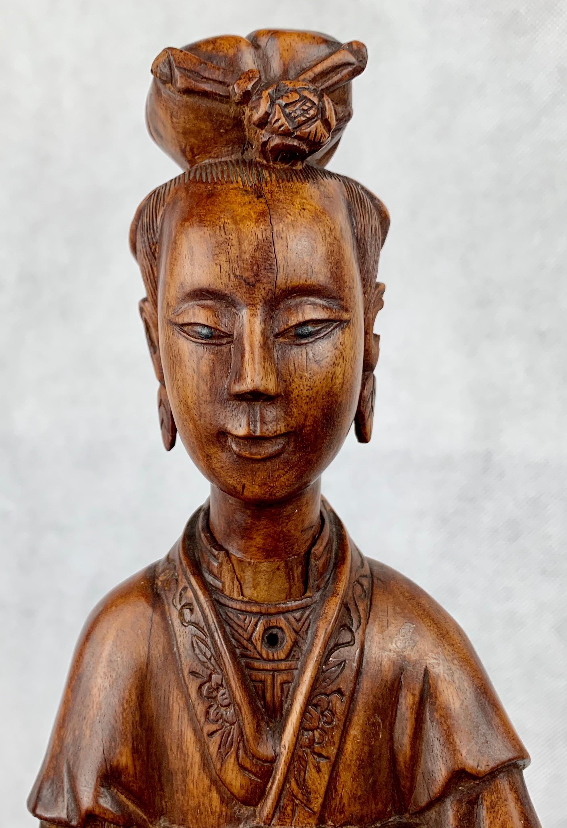 Hand Carved Teak Chinese Figure Holding a Ruy In Good Condition For Sale In West Palm Beach, FL