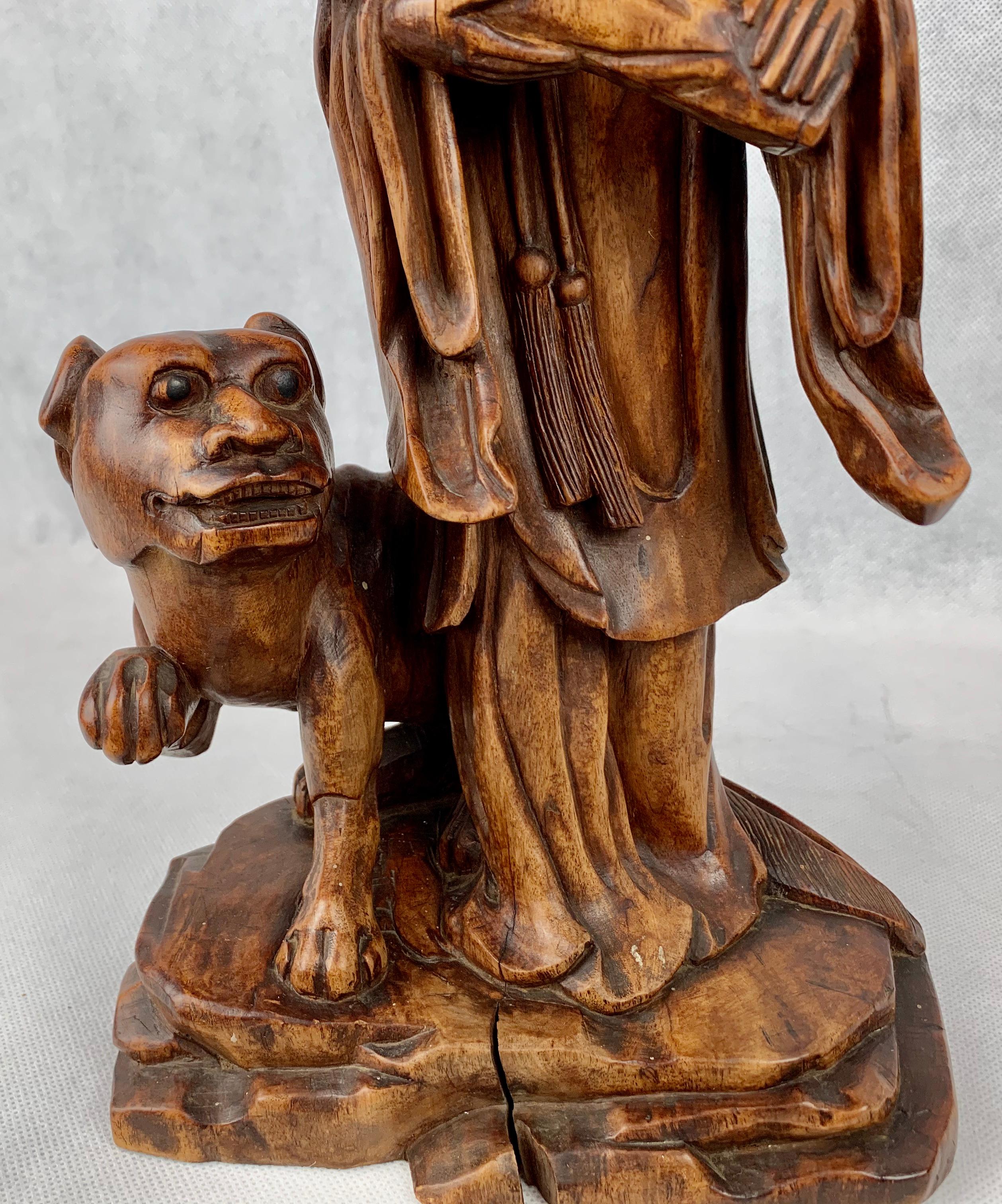 20th Century Hand Carved Teak Chinese Figure Holding a Ruy For Sale