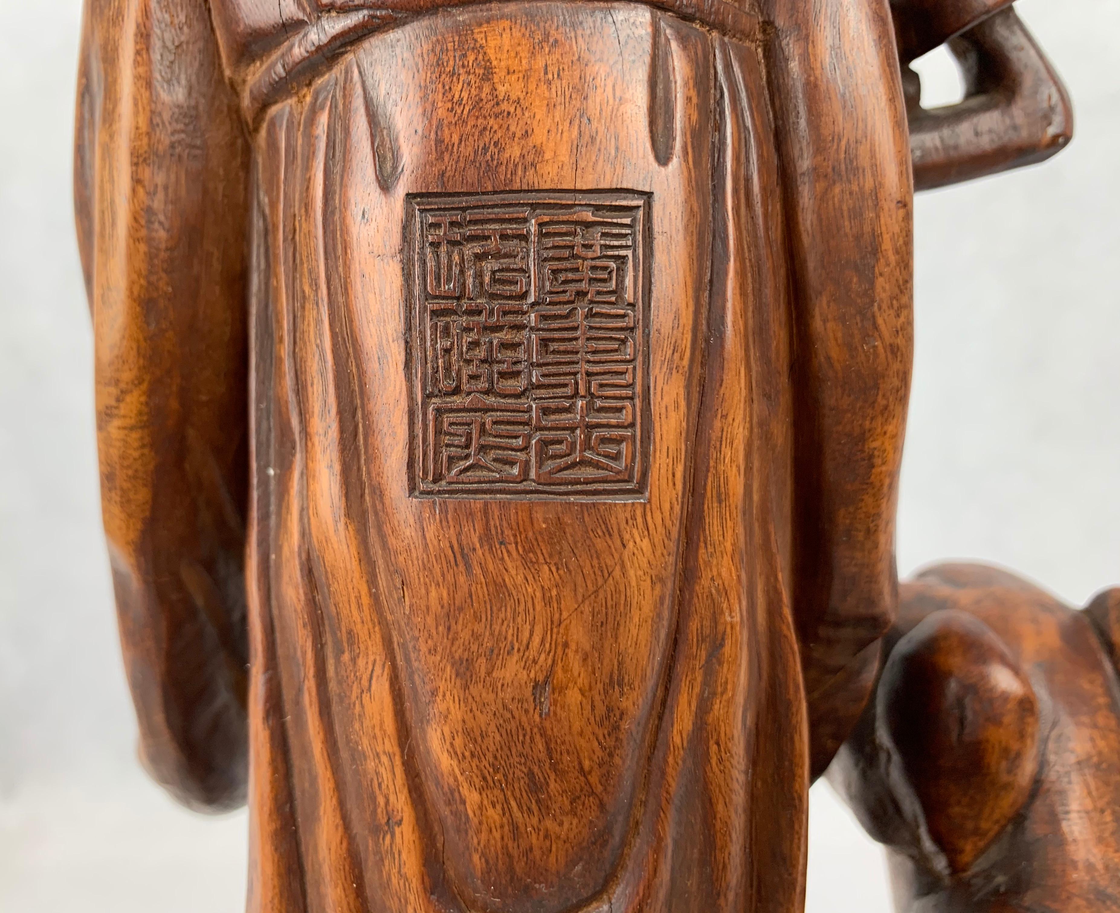 Hand Carved Teak Chinese Figure Holding a Ruy For Sale 1