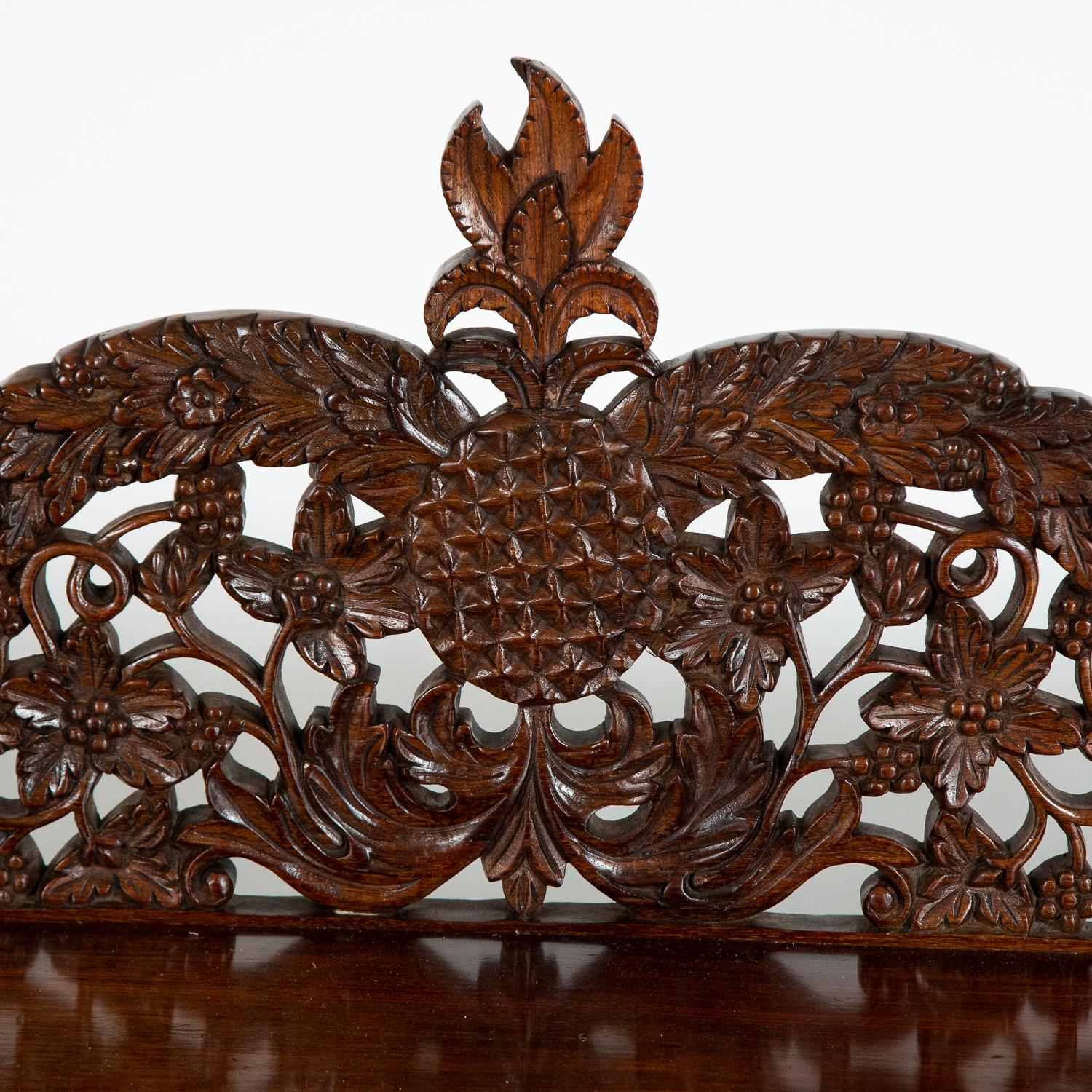 carved teak table