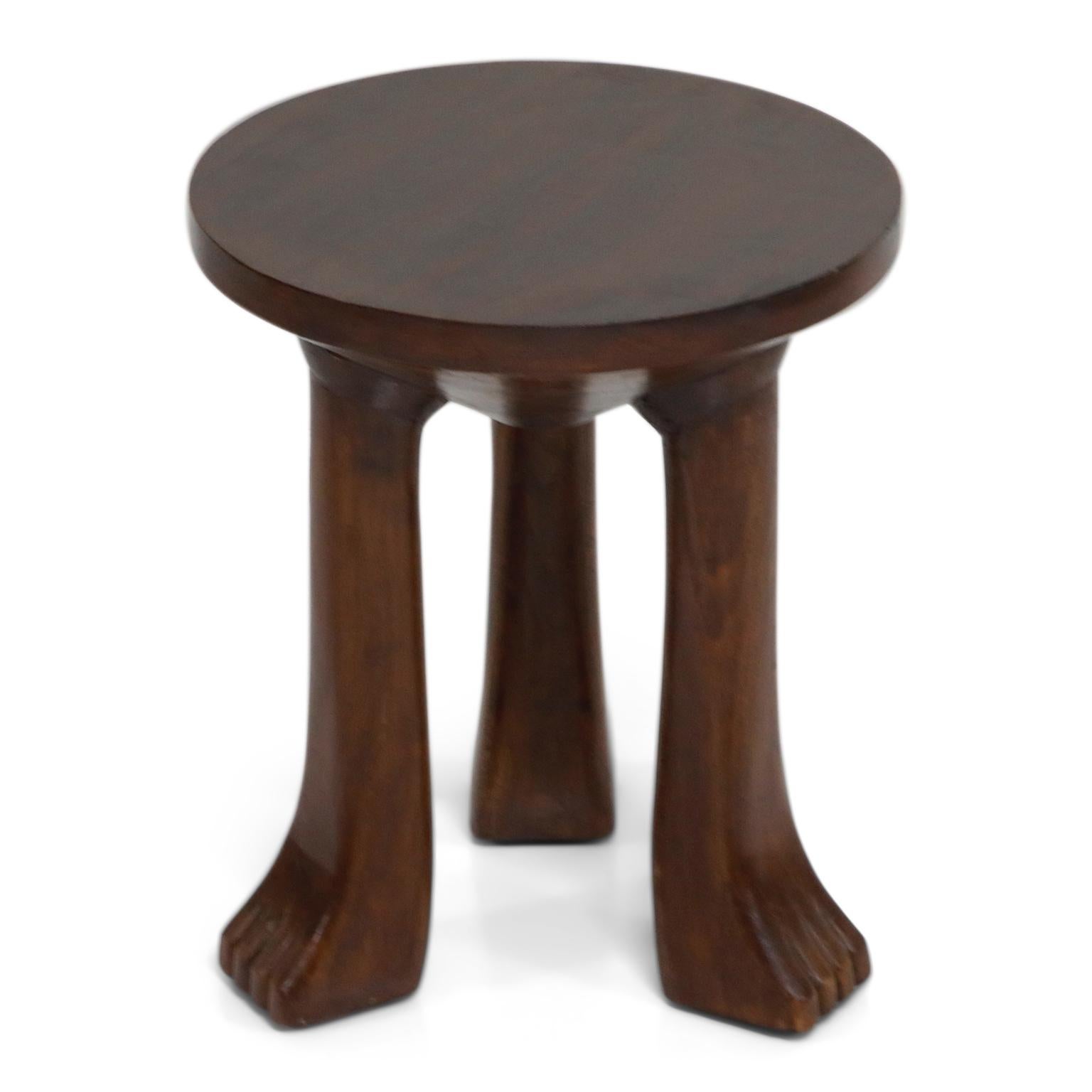 Late 20th Century Carved Teak Three-Legged Lionfoot Stools in the Style of John Dickinson