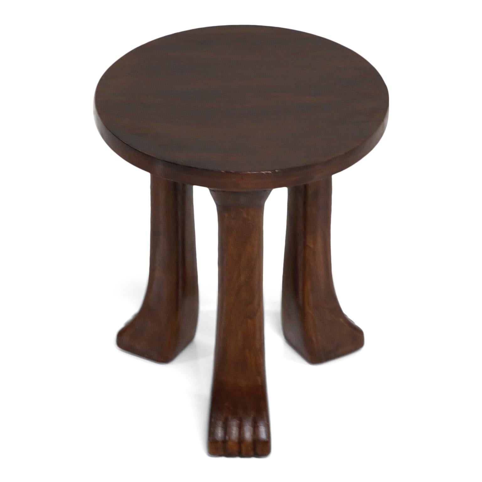 Carved Teak Three-Legged Lionfoot Stools in the Style of John Dickinson 2