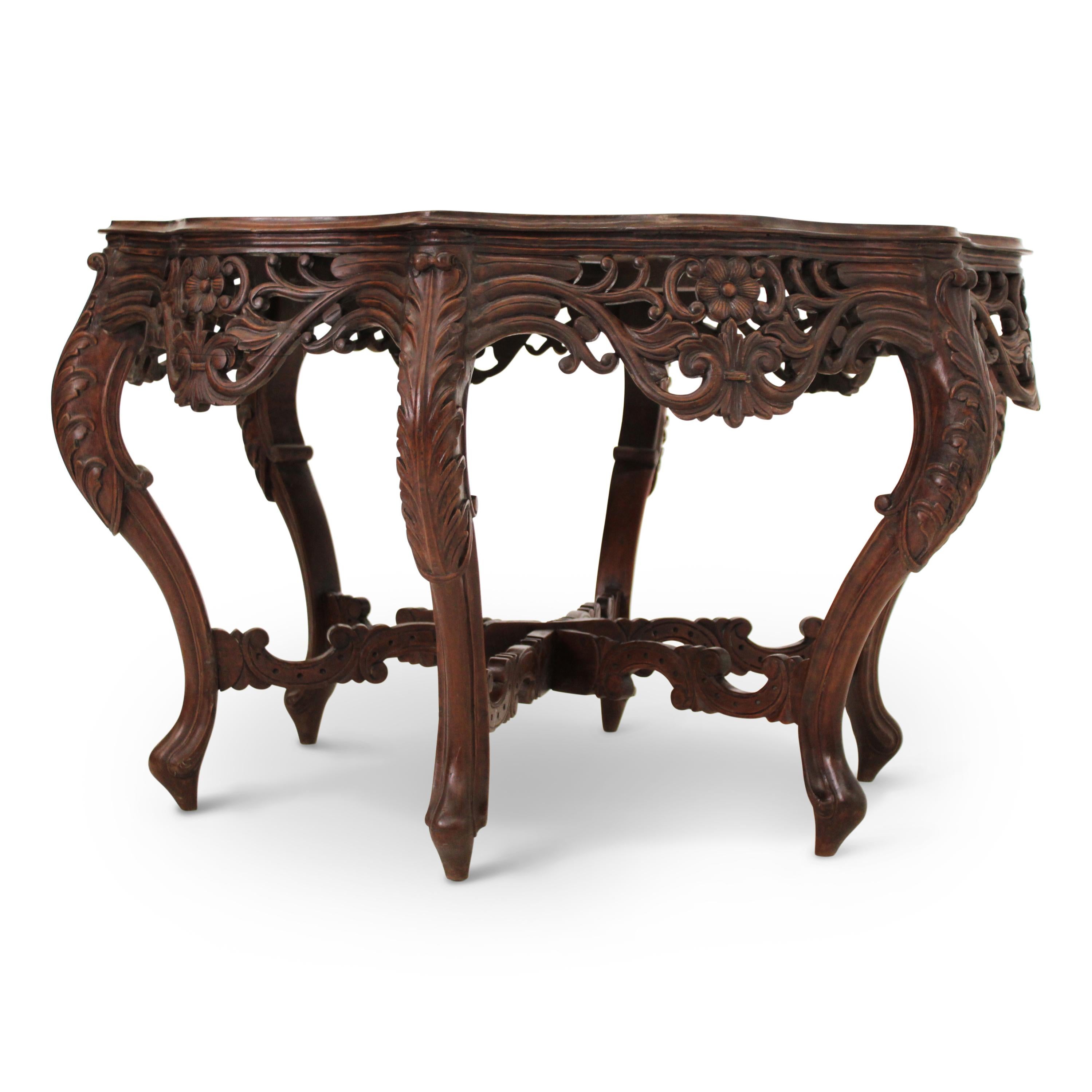 Anglo-Indian Carved Teak Center Table For Sale
