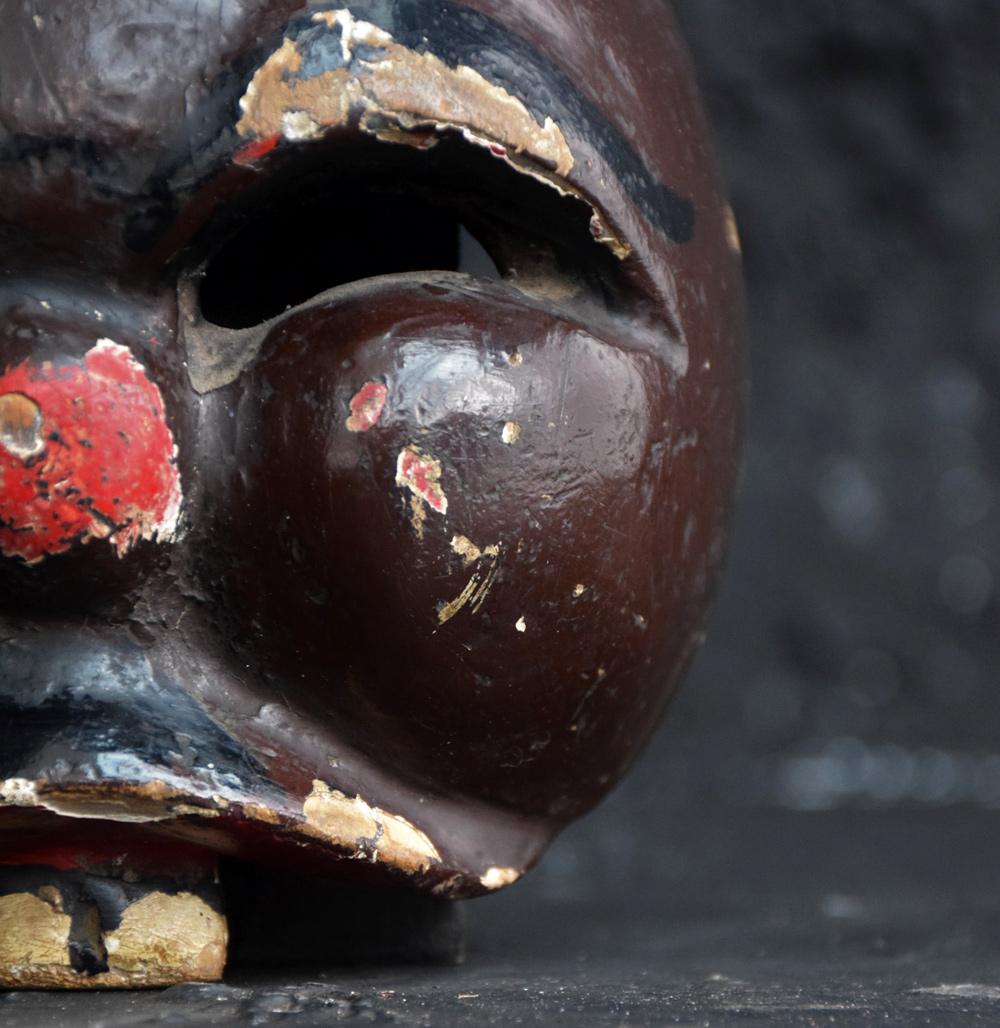 Item: Mid-20th century carved wooden theatre mask

This item was discovered in France and would have originally been used in the early to mid-20th Century theatre production, the mask depicts a humorous character. This artefact is carved from a