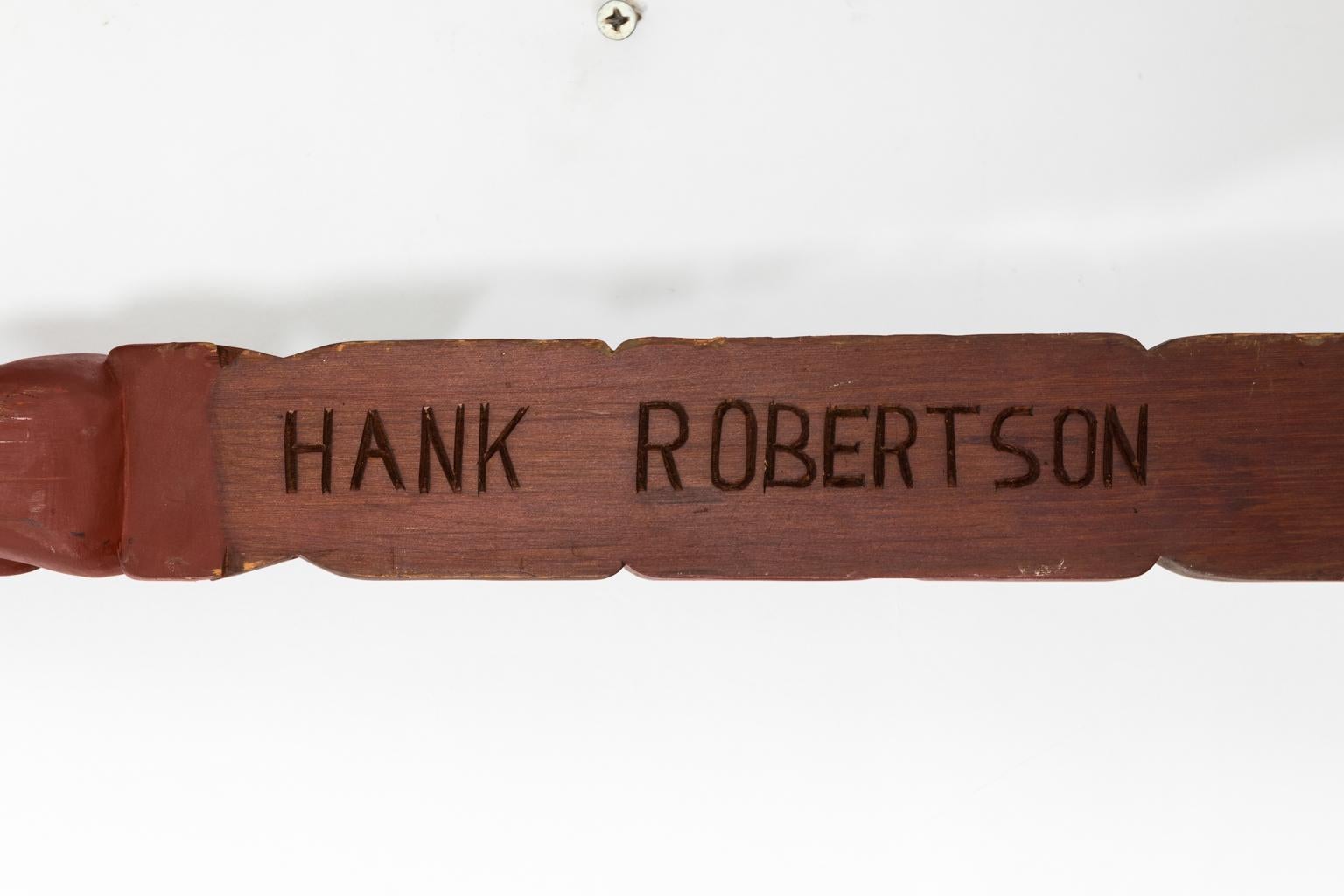 Contemporary wood carved and hand painted totem pole by Hand Robertson.
 