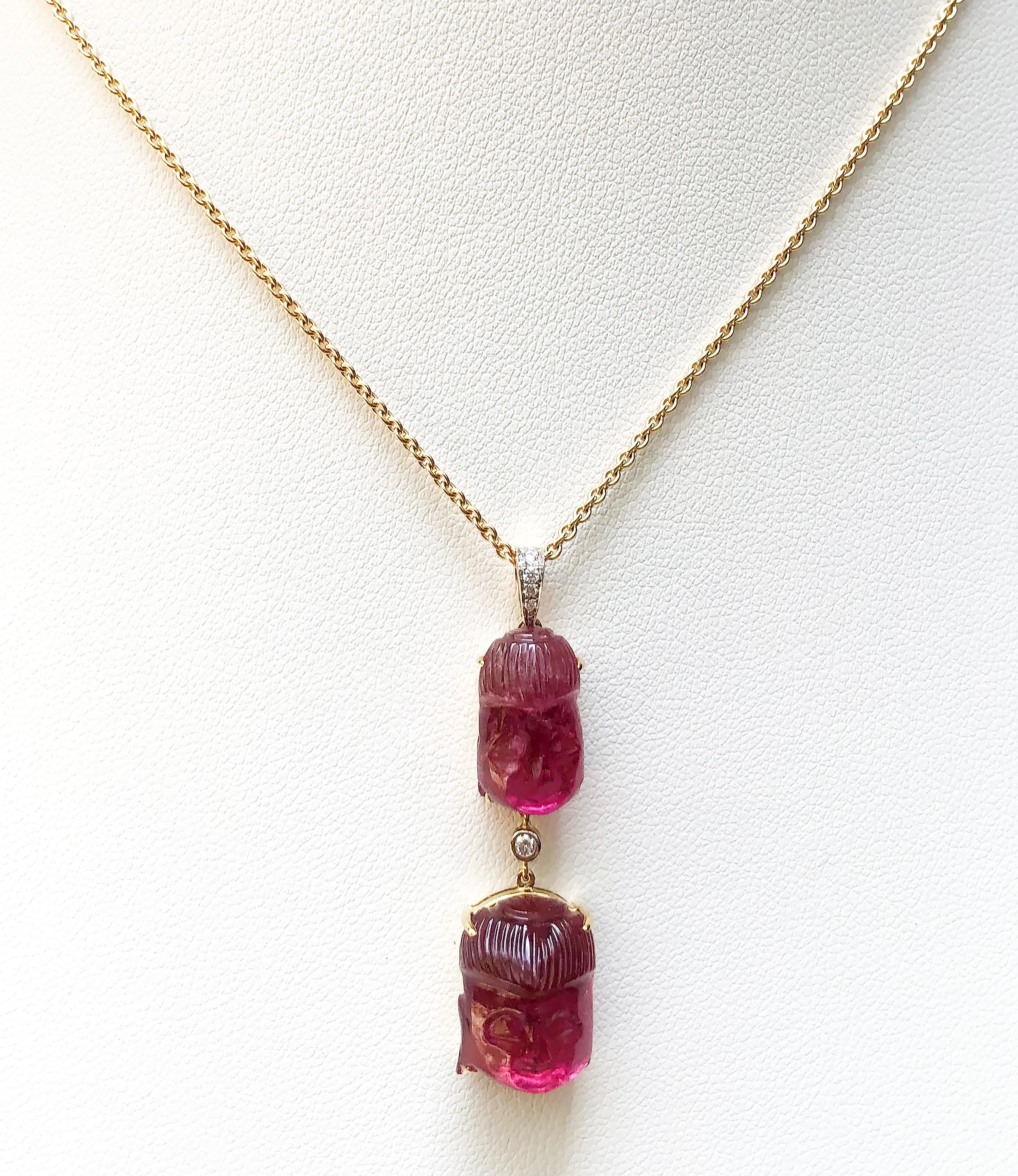Tourmaline 18.39 carats with Diamond 0.05 carat Pendant set in 18 Karat Gold Settings
(chain not included)

Width:  1.0 cm 
Length: 4.1 cm
Total Weight: 6.94 grams

