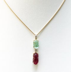 Carved Tourmaline with Diamond Buddha Pendant Set in 18 Karat Gold Settings