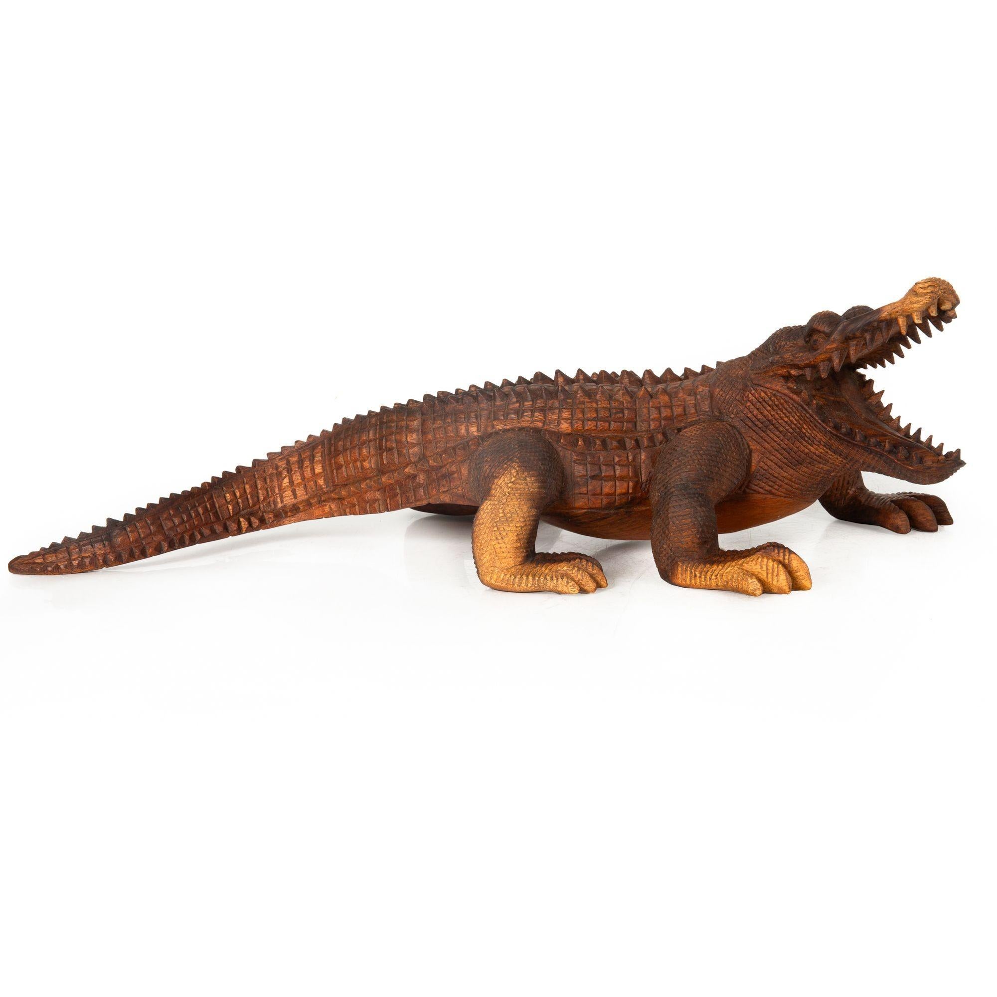 CARVED TROPICAL HARDWOOD CROCODILE FIGURE
Probably mid-20th century

6 7/8