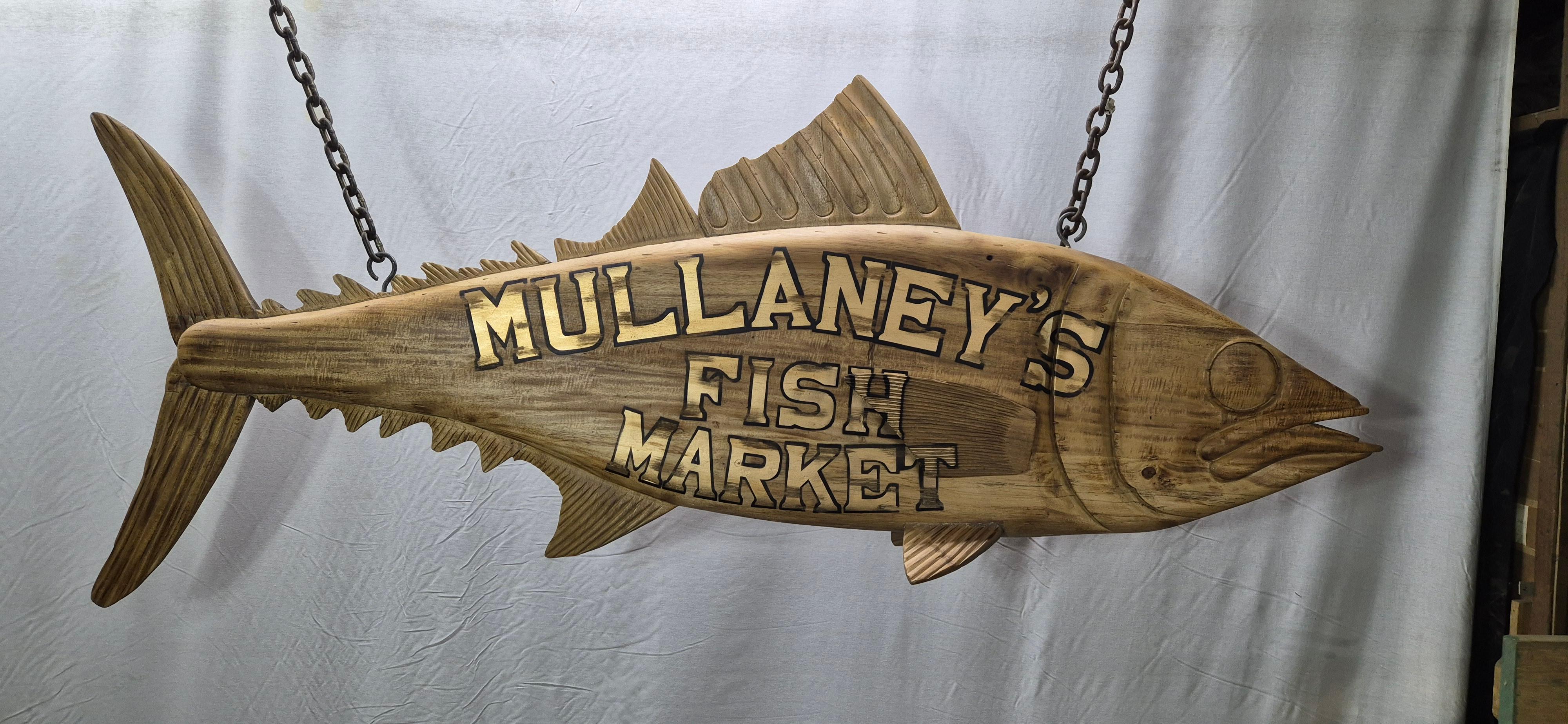 Carved wood tuna fish trade sign with 