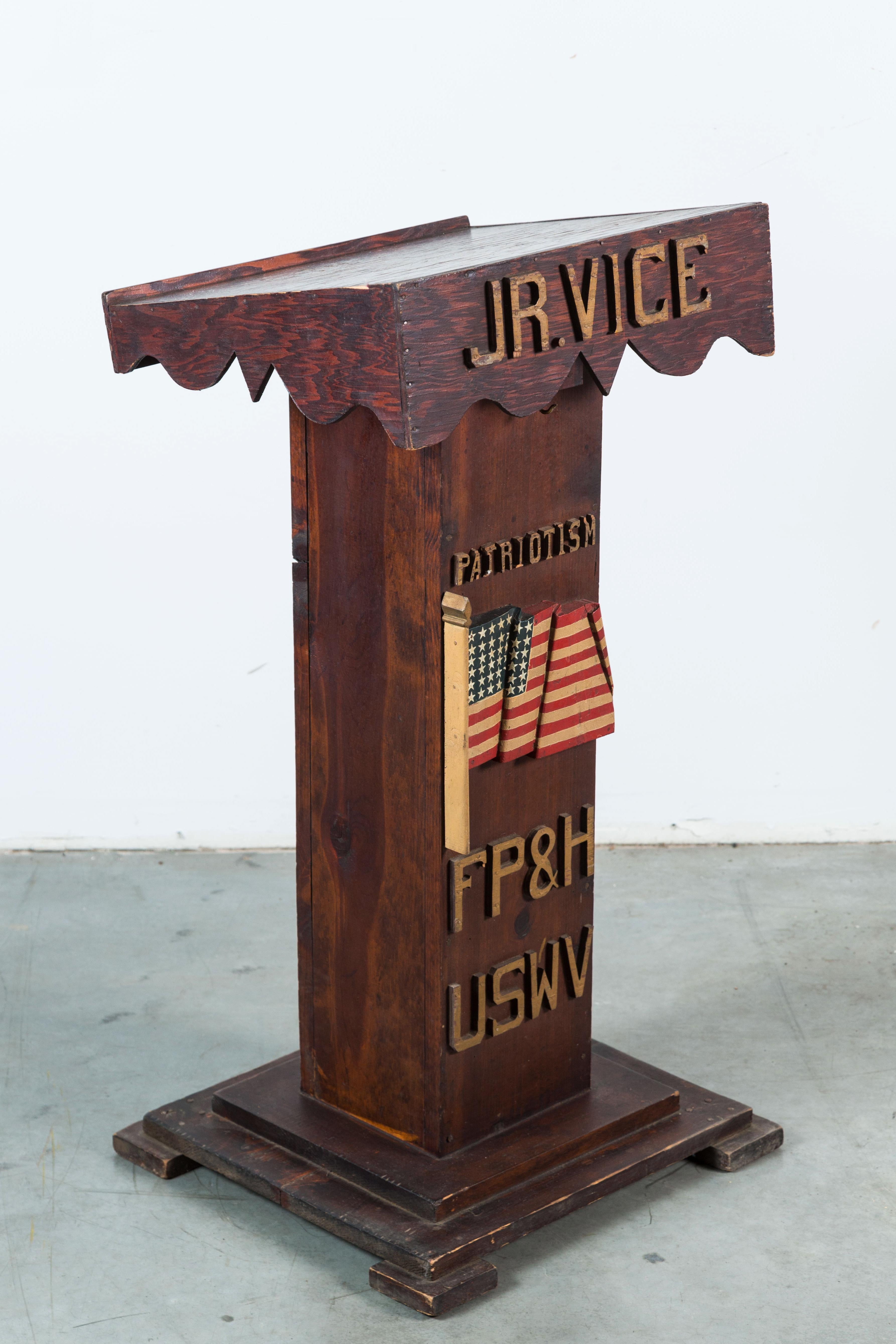 Wood Carved USWV Lodge Pedestal Podiums Folk Art American Flag and Clasped Hands For Sale