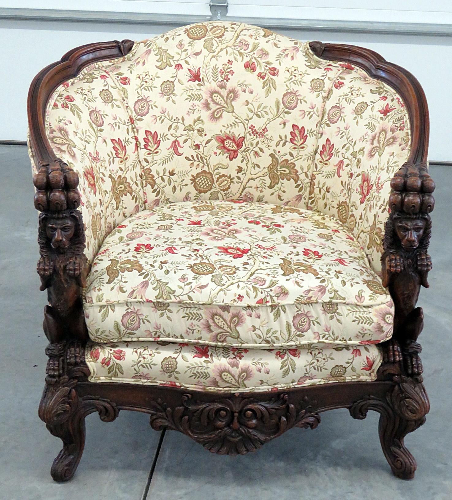 Carved Victorian bergère with tapestry upholstery.