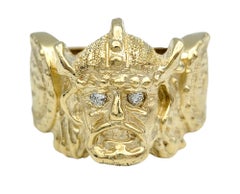 Carved Viking and Shield Band Ring with Diamond Eyes Set in 14 Karat Yellow Gold