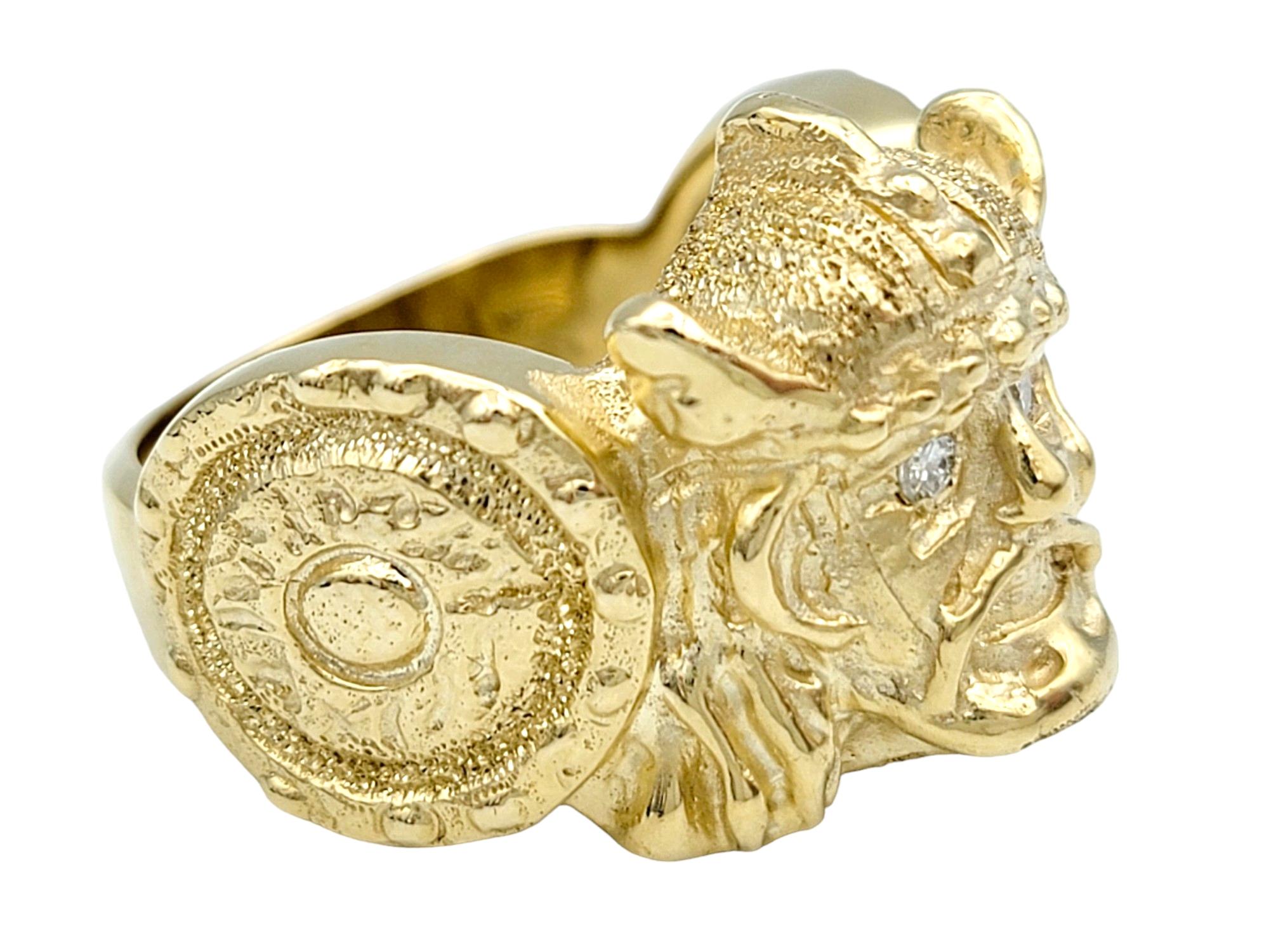 Carved Viking and Shield Band Ring with Diamond Eyes Set in 14 Karat Yellow Gold In Good Condition For Sale In Scottsdale, AZ