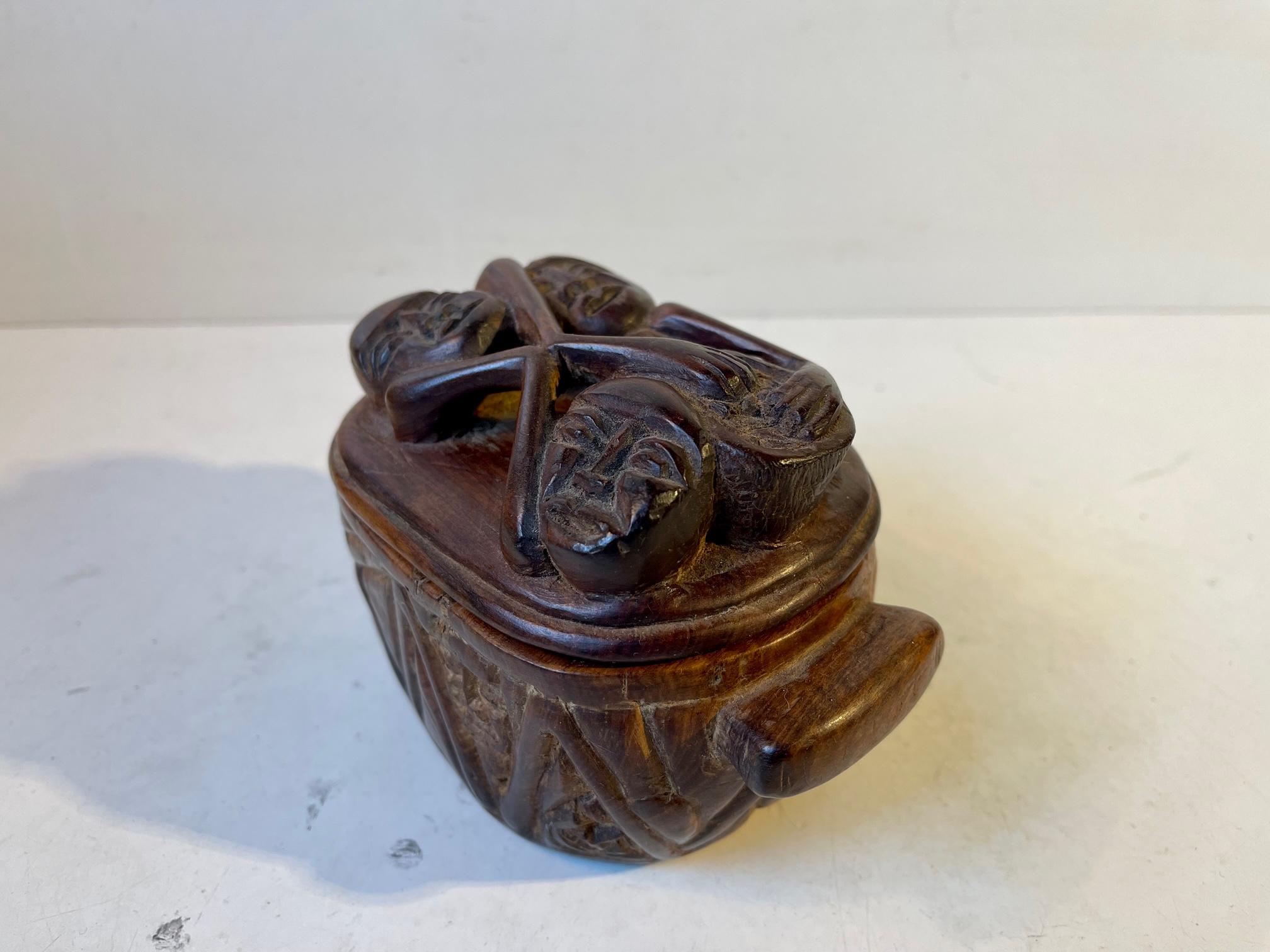 Carved Vintage Canister with Cannibals, Brain Eaters For Sale 4