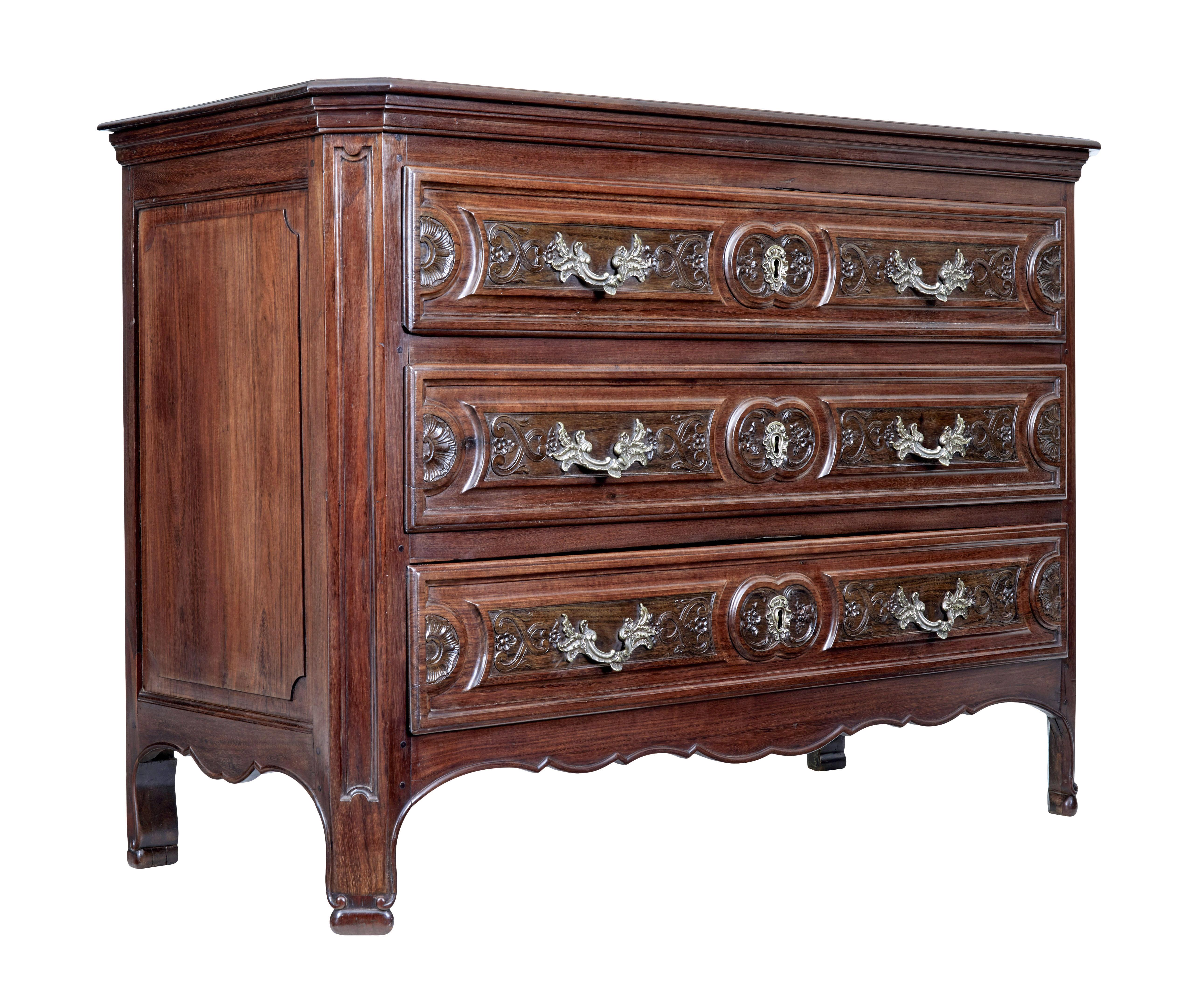 Carved walnut 19th century french provincial commode circa 1850.

Stunning example of a mid-19th century french walnut provincial commode. 3 drawers with profusely carved in rosewood inserts. Fitted with original ornate handles and