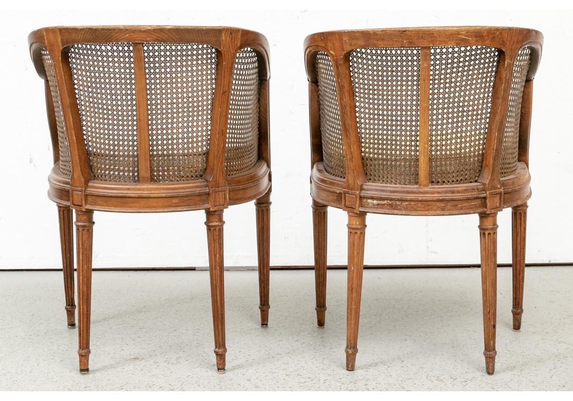 Carved Walnut and Caned French Tub Chairs Tardif Paris, Cabinetmaker 1