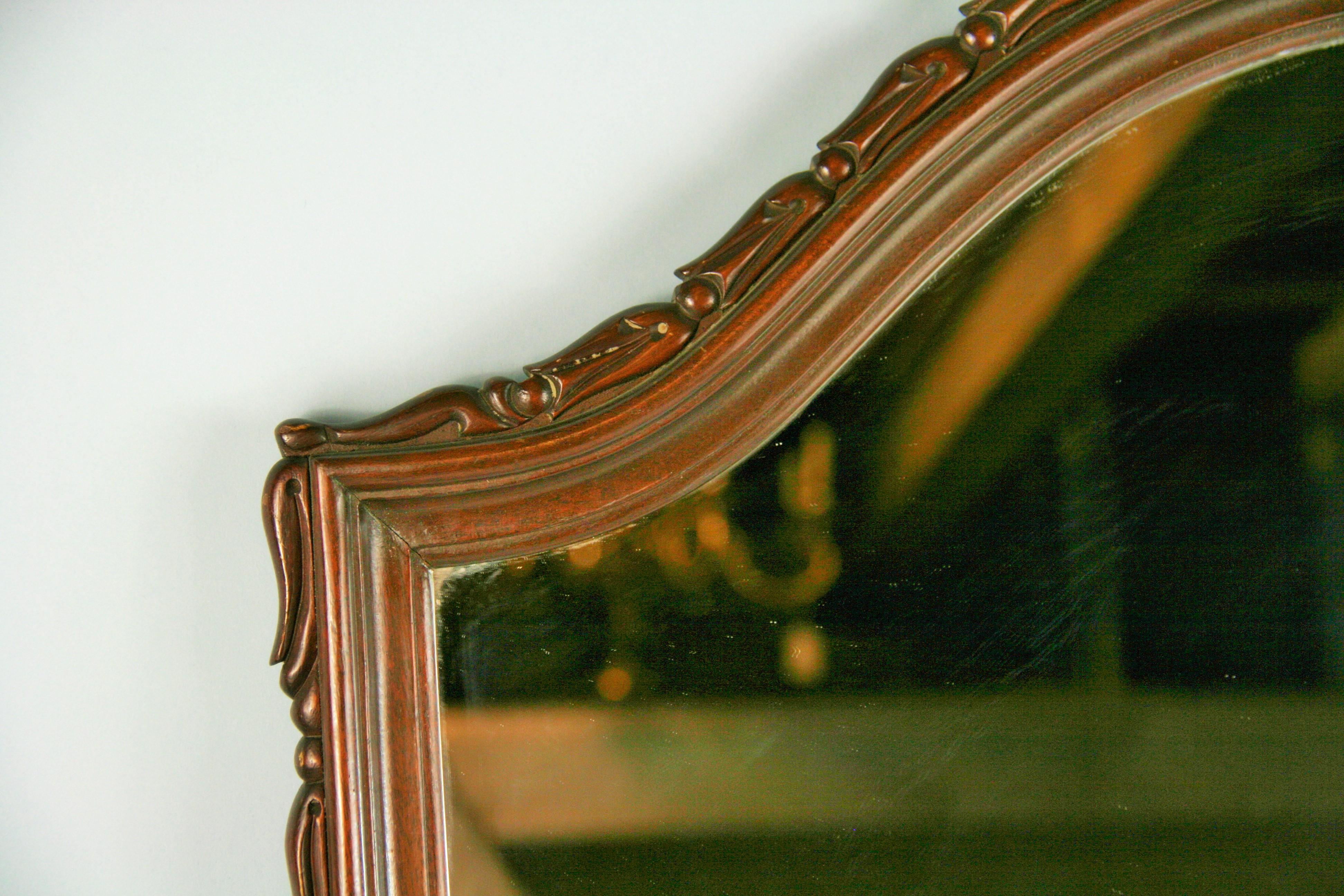 Mid-20th Century Carved Walnut Arch Top Mirror For Sale