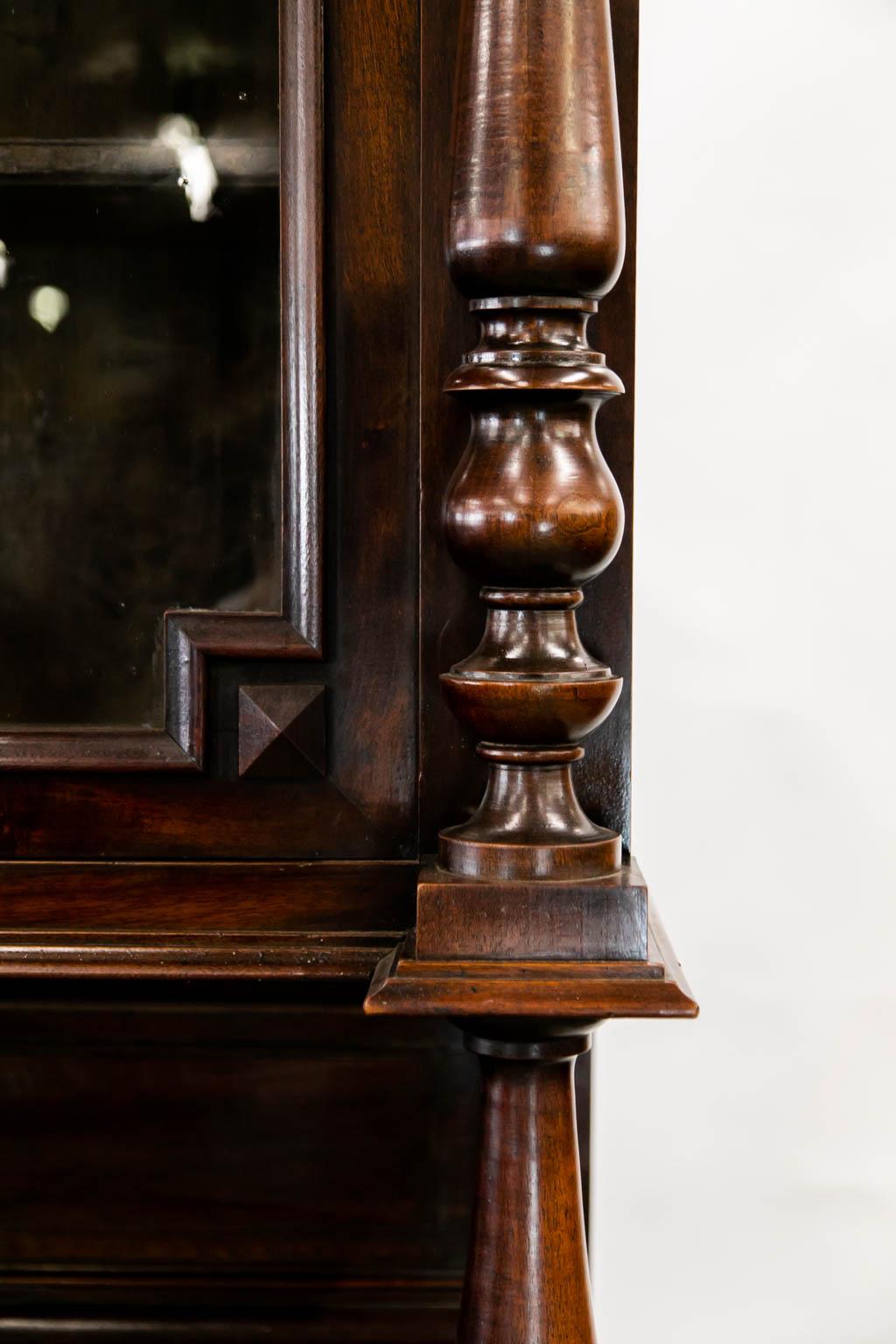 The top of this cupboard has the original blown wavy glass panes. The top has one adjustable shelf. The bottom shelf is fixed. Hardware is later.