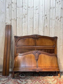 Carved walnut basket bed, Louis XVI style
