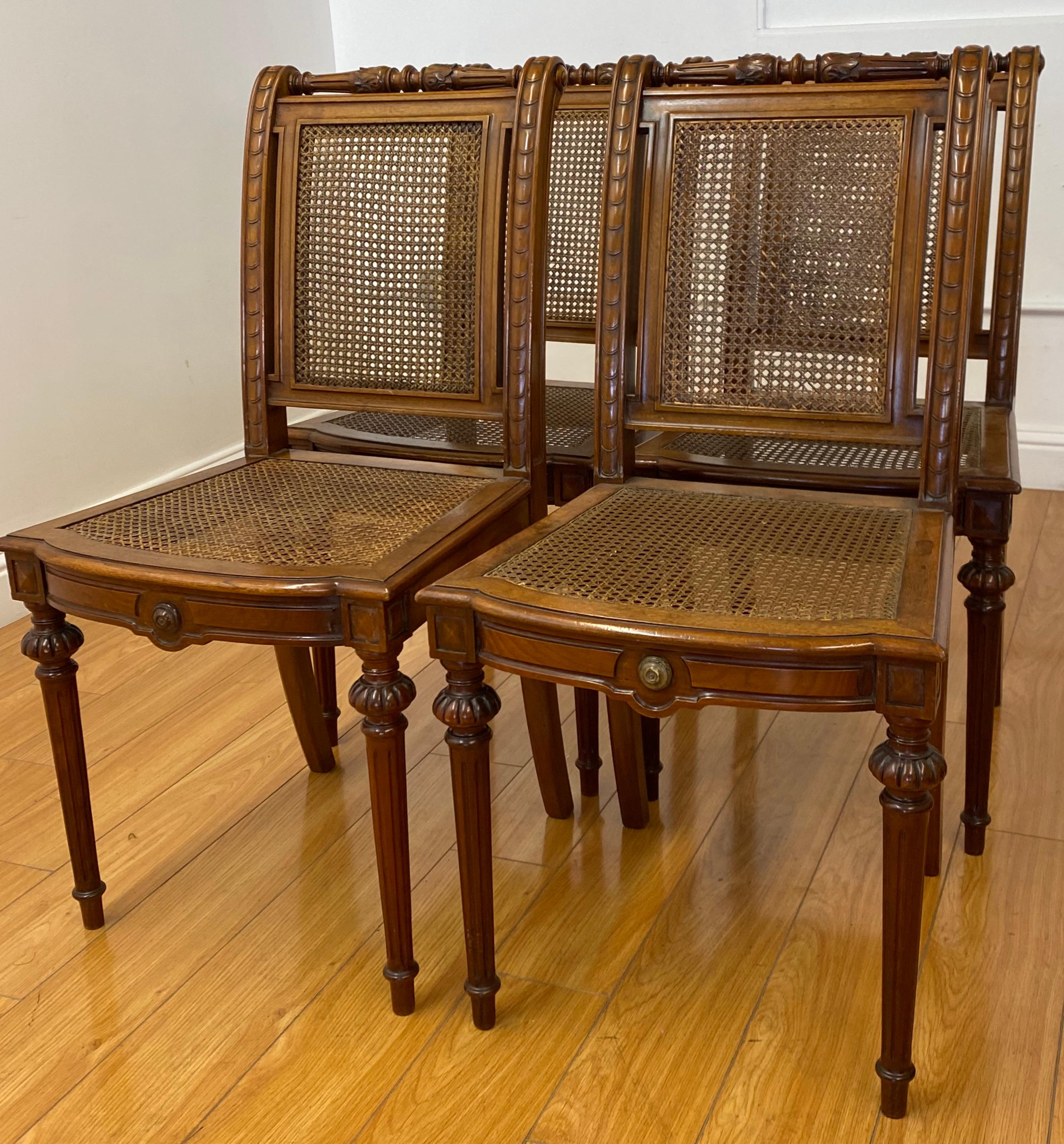 Carved walnut & cane side chairs, C.1940

Gorgeous set of four dining chairs

One of the chairs shows a past professional repair (see pics), the chairs are solid and sturdy

Offered as a matching set of four only

Measures: 18.5