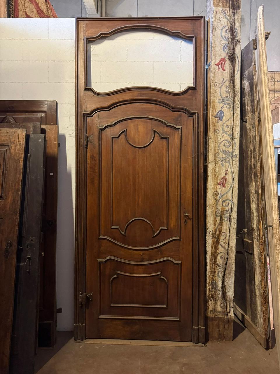 18th Century and Earlier Carved walnut door with a tall frame and space for an overdoor, Italy For Sale