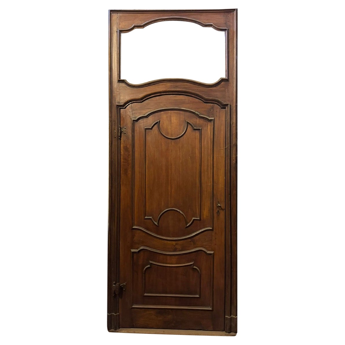 Carved walnut door with a tall frame and space for an overdoor, Italy For Sale