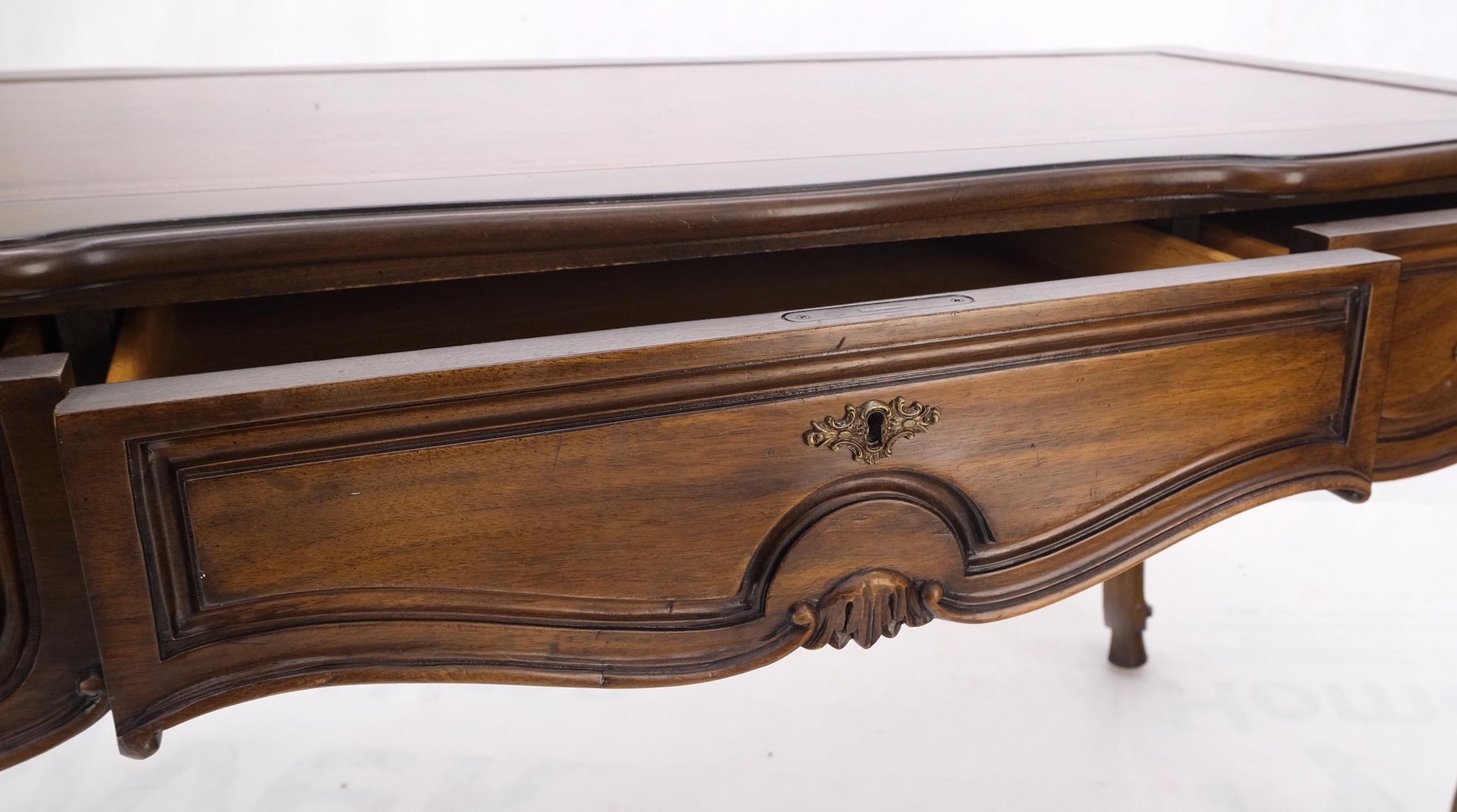 Carved walnut embossed leather top country 3 drawer french desk.