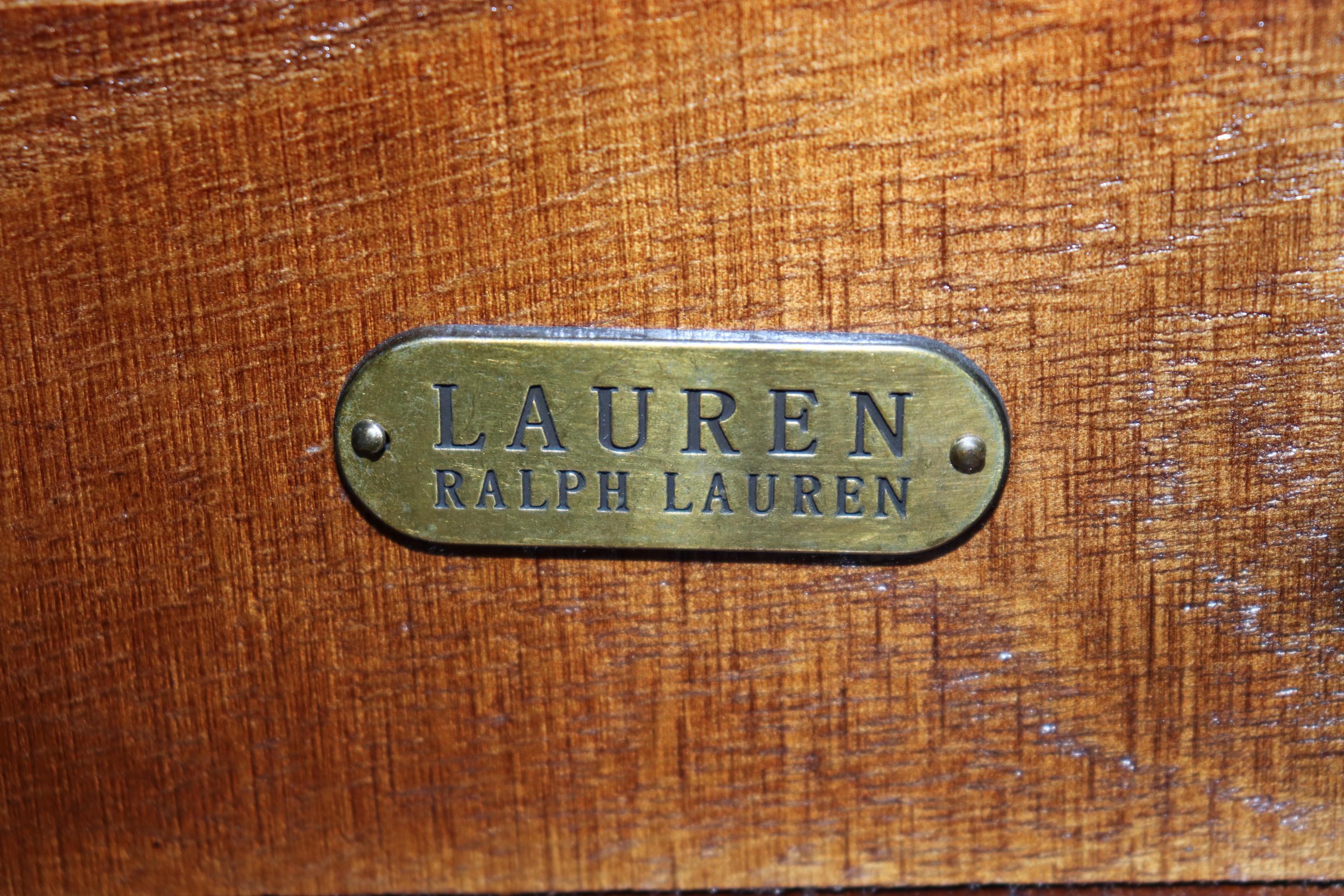 Beyond clothing and jewelery, Ralph lauren is known for his fine design in home furnishings. The dresser or commode shown here is painstakingly designed to replicate a fine French commode from the 1800s era. This piece is absolutely gorgeous and