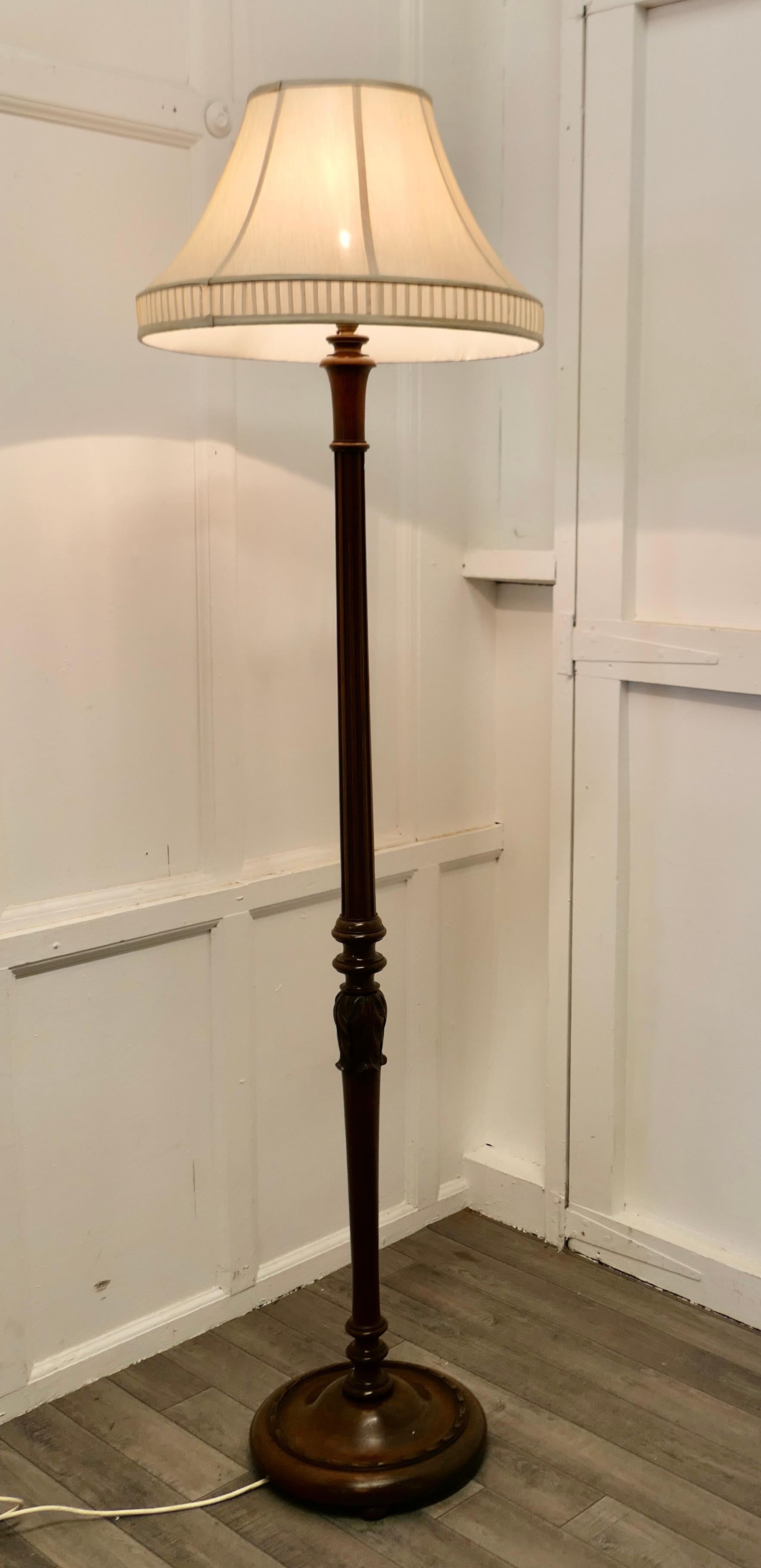 Carved Walnut Floor Standing or Standard Lamp

This is a very attractive good quality piece in figured walnut, the lamp stands on a beautifully carved walnut base and has an attractively turned and reeded upright column
The lamp is in good