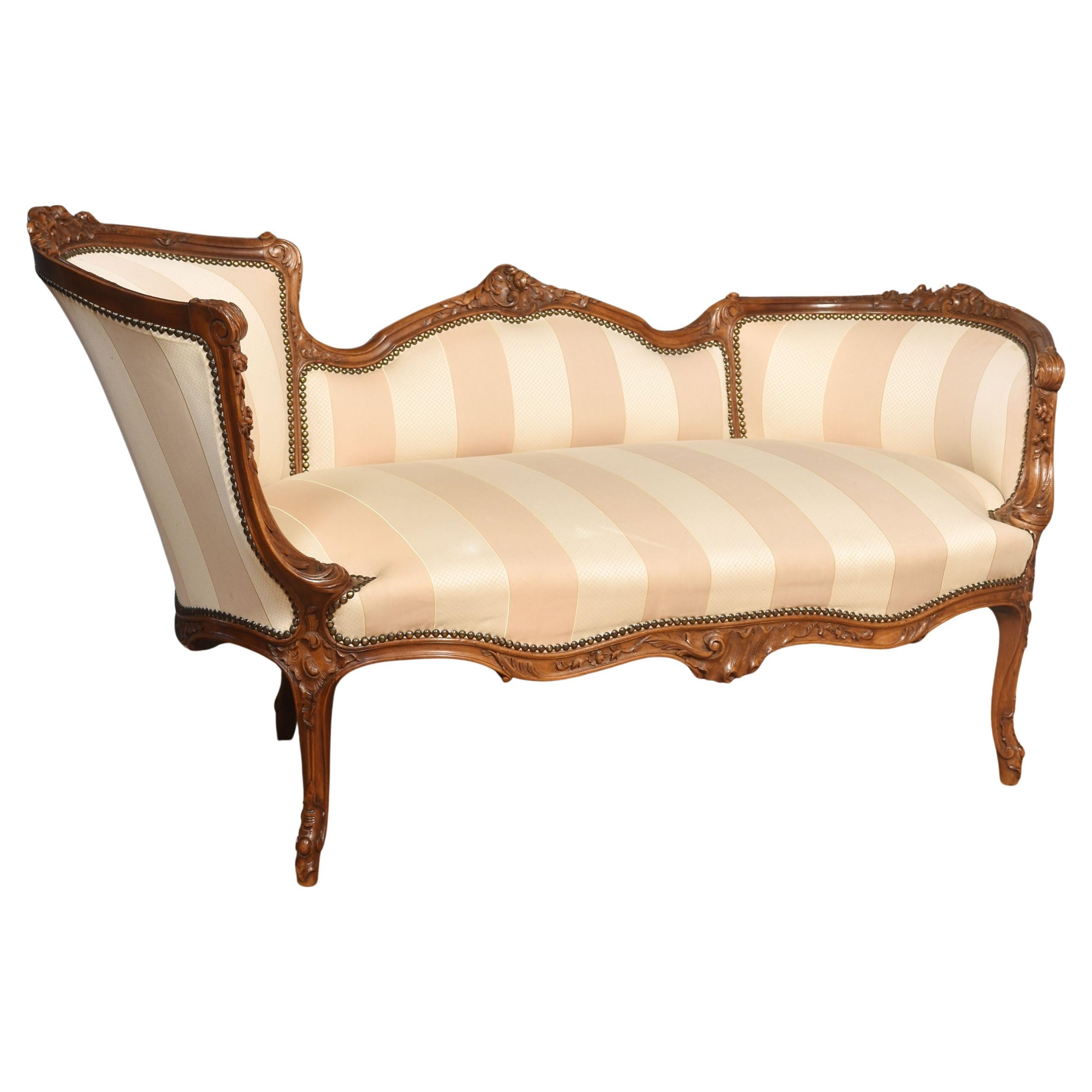Carved walnut framed settee