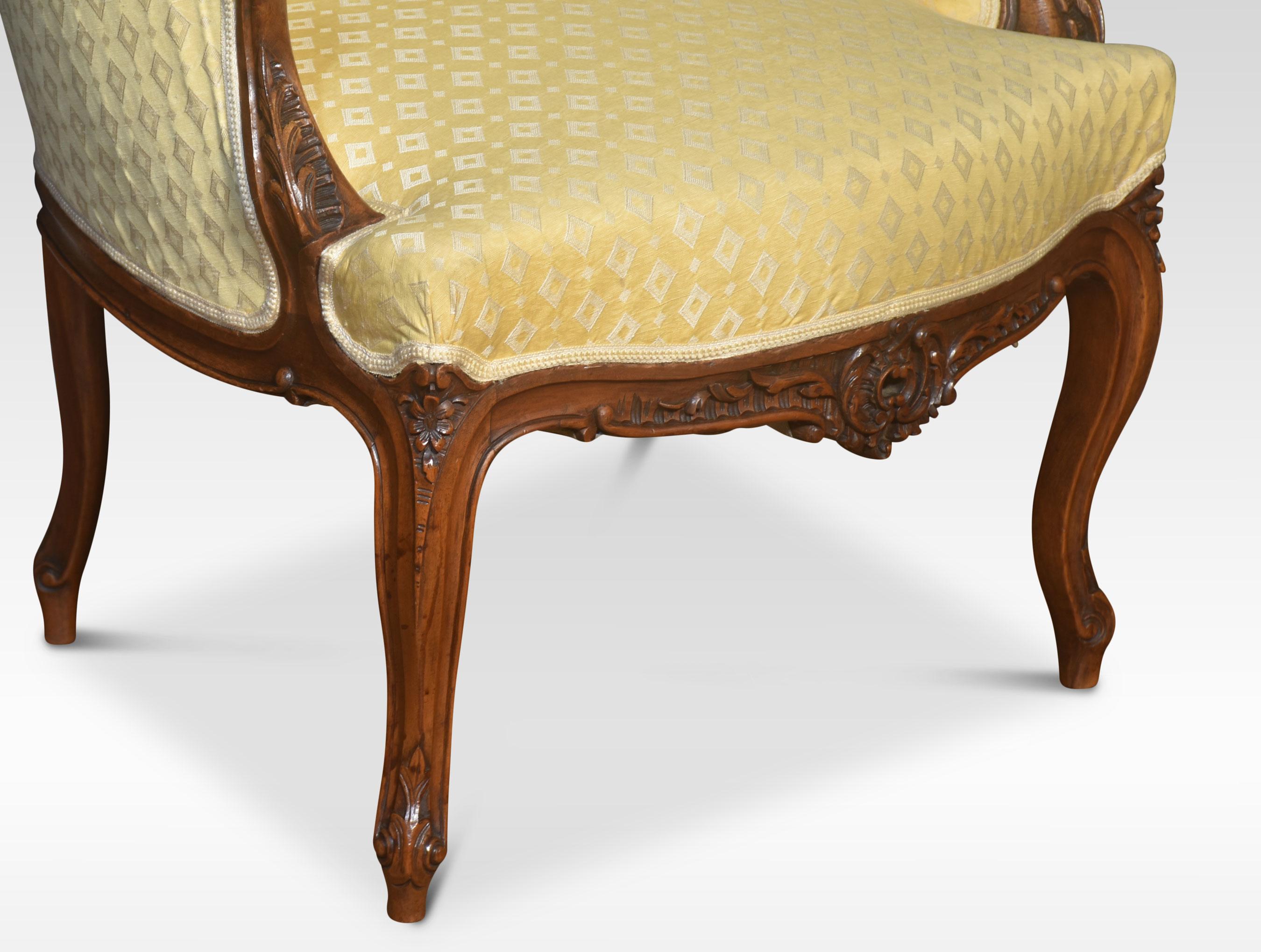 Walnut armchair the carved decorated frame to the upholstered back and seat enclosed by scrolling arms. All raised up on four slender cabriole supports terminating in scrolling toes.
Dimensions
Height 34 Inches height to seat 17.5 Inches
Width 25