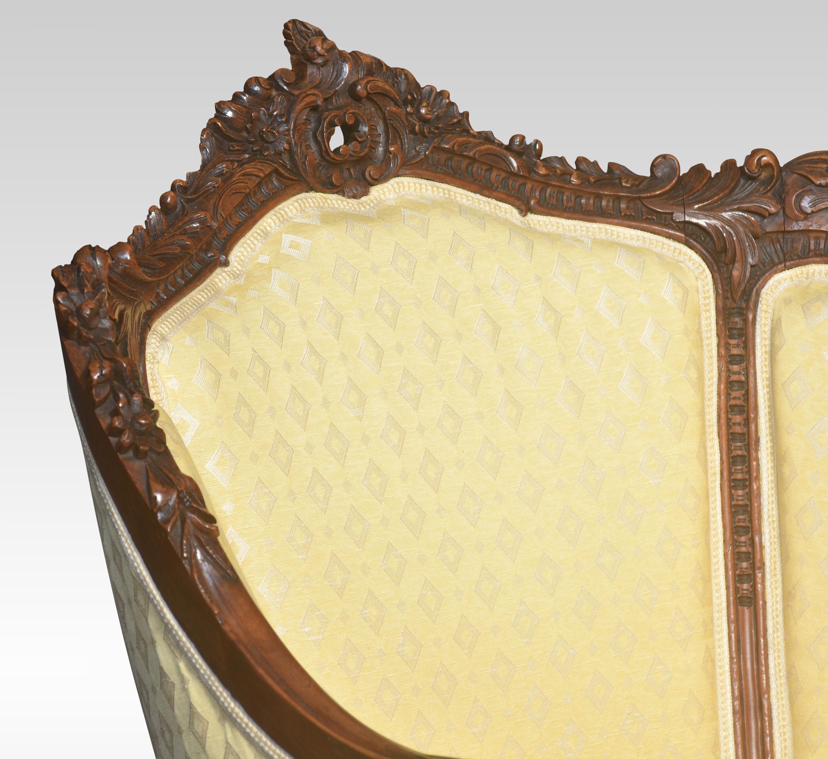 British Carved walnut framed tub armchair For Sale