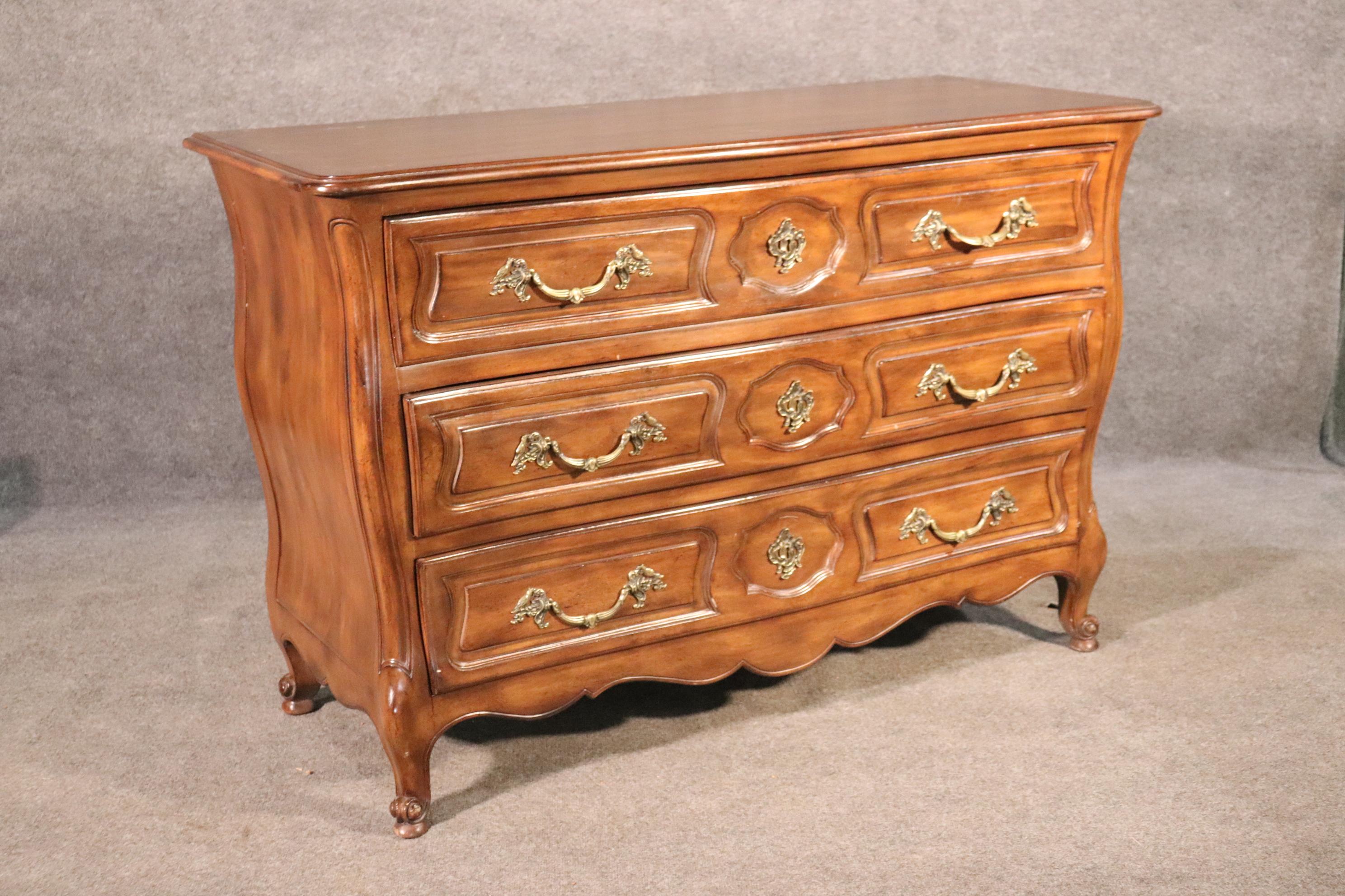 This is a simple and yet beautiful French Louis XV style dresser commode. The commode measures 37 tall x 56 wide x 23 deep. The piece is in good vintage condition.