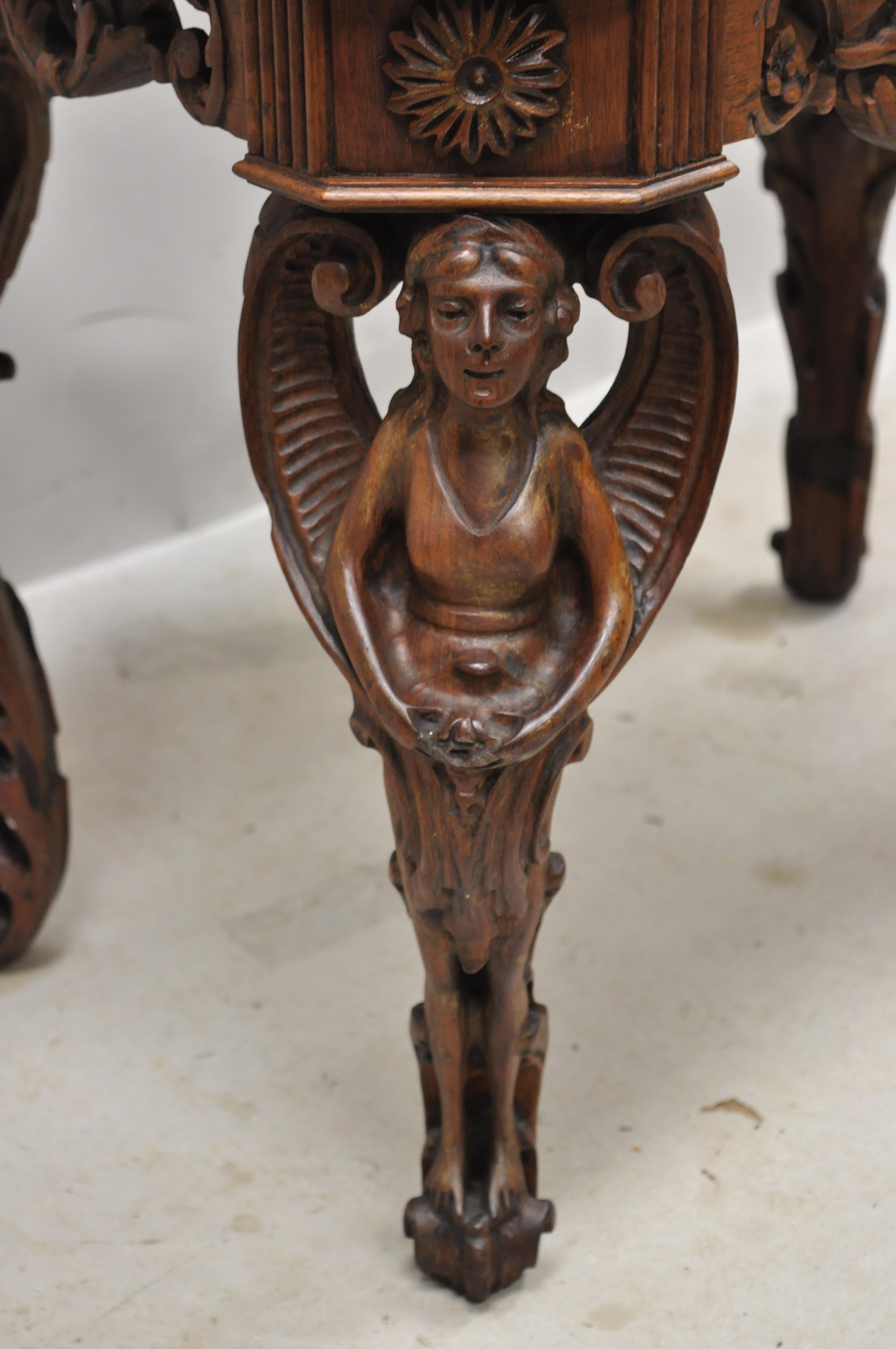 North American Carved Walnut French Renaissance Small Figural Coffee Table with Winged Maidens