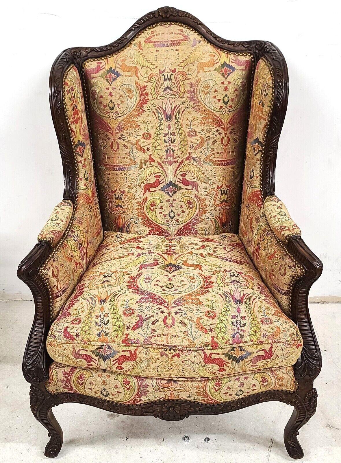 Offering One Of Our Recent Palm Beach Estate Fine Furniture Acquisitions Of A
Really Stunning Carved Walnut French Wingback Library Reading Chair by E J VICTOR
Featuring detail carvings, a matching bolster pillow, and a down and foam cushion