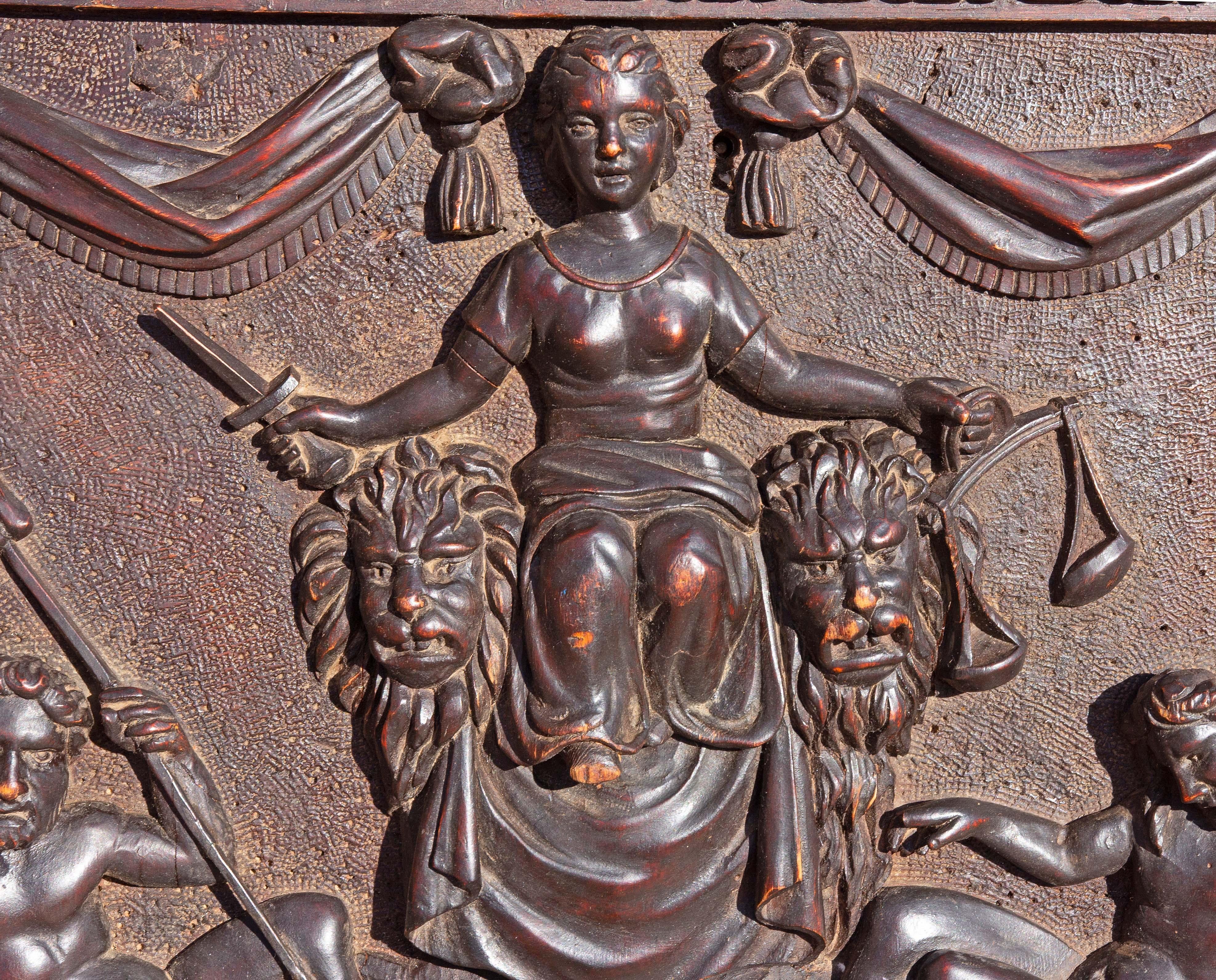 Antique carved walnut door panel. 19th century . Continental. Featuring lady justice, Neptune, lions, and Baccus?.