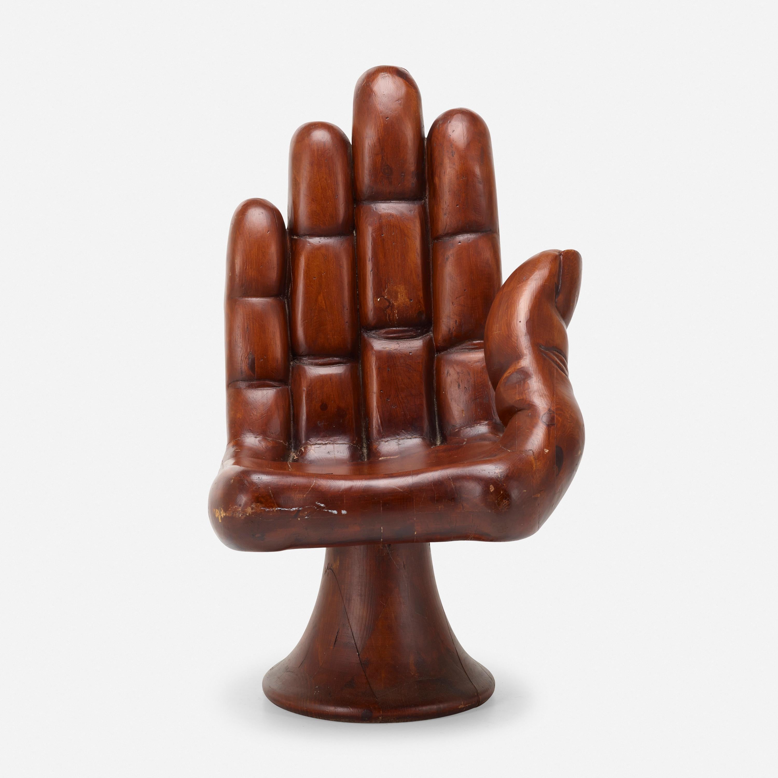 Carved Walnut Pedro Friedeberg style hand chair.