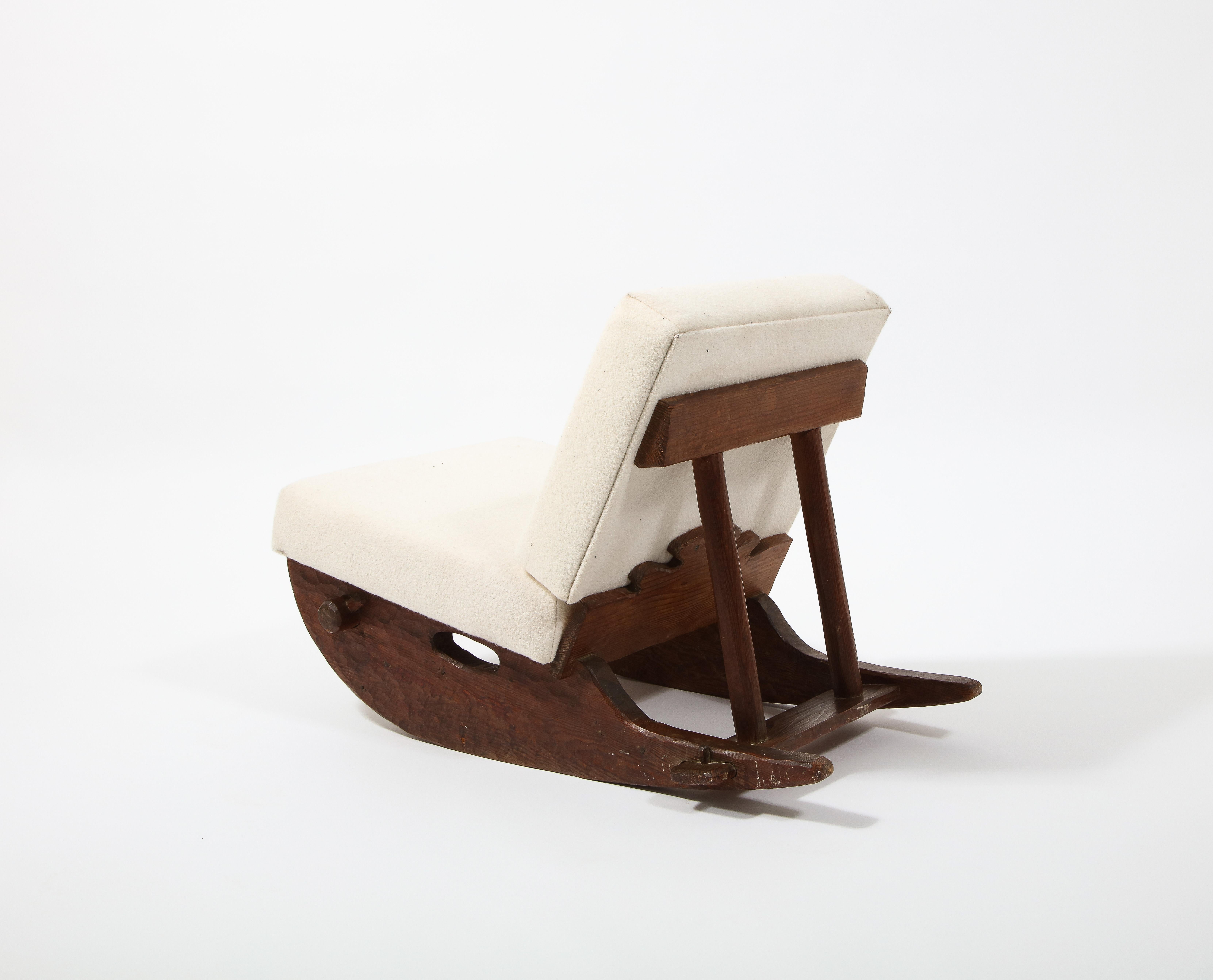 Brutalist Carved Walnut Rocking Chair after Jean Touret, France 1950's In Good Condition For Sale In New York, NY