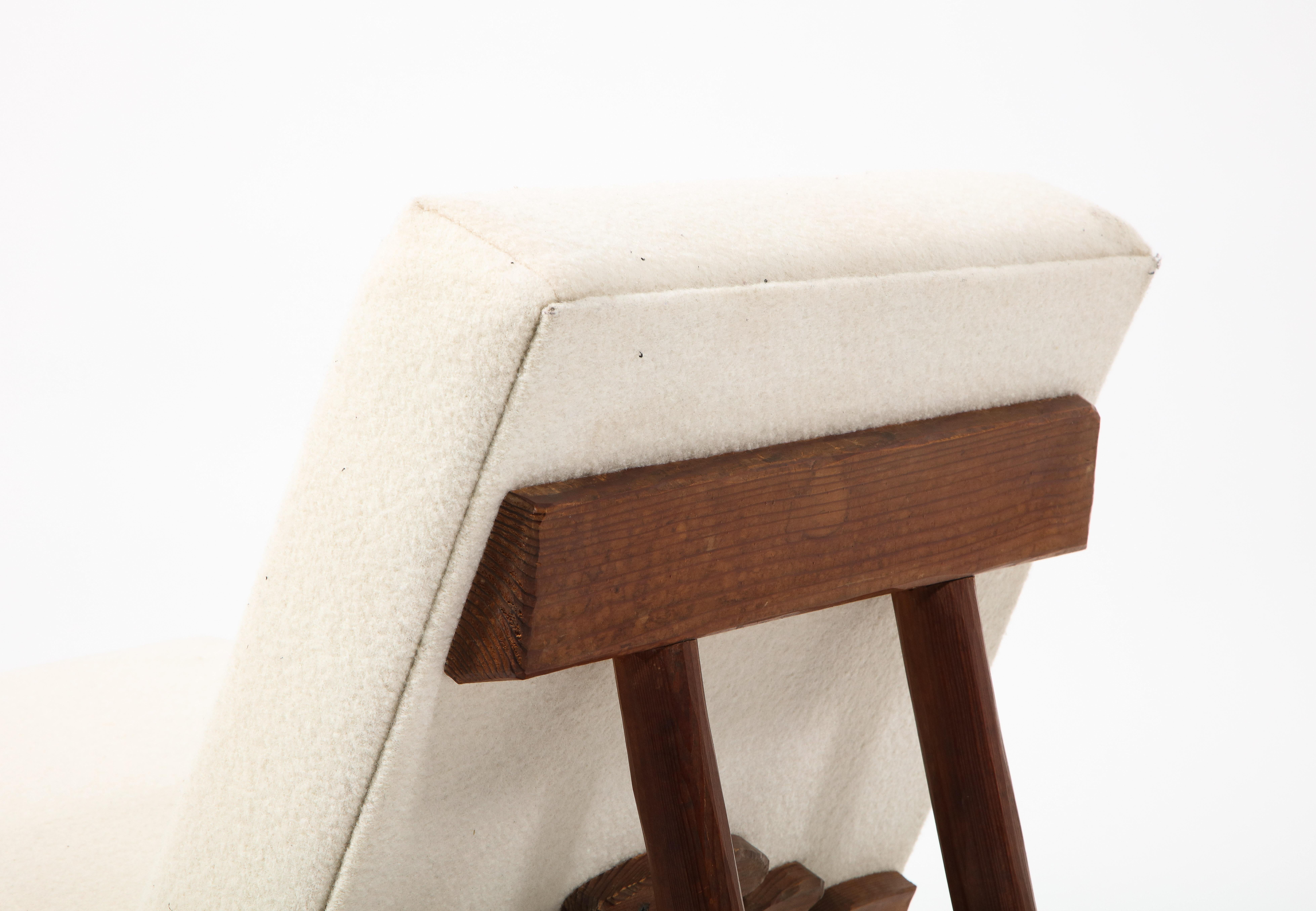 20th Century Brutalist Carved Walnut Rocking Chair after Jean Touret, France 1950's For Sale