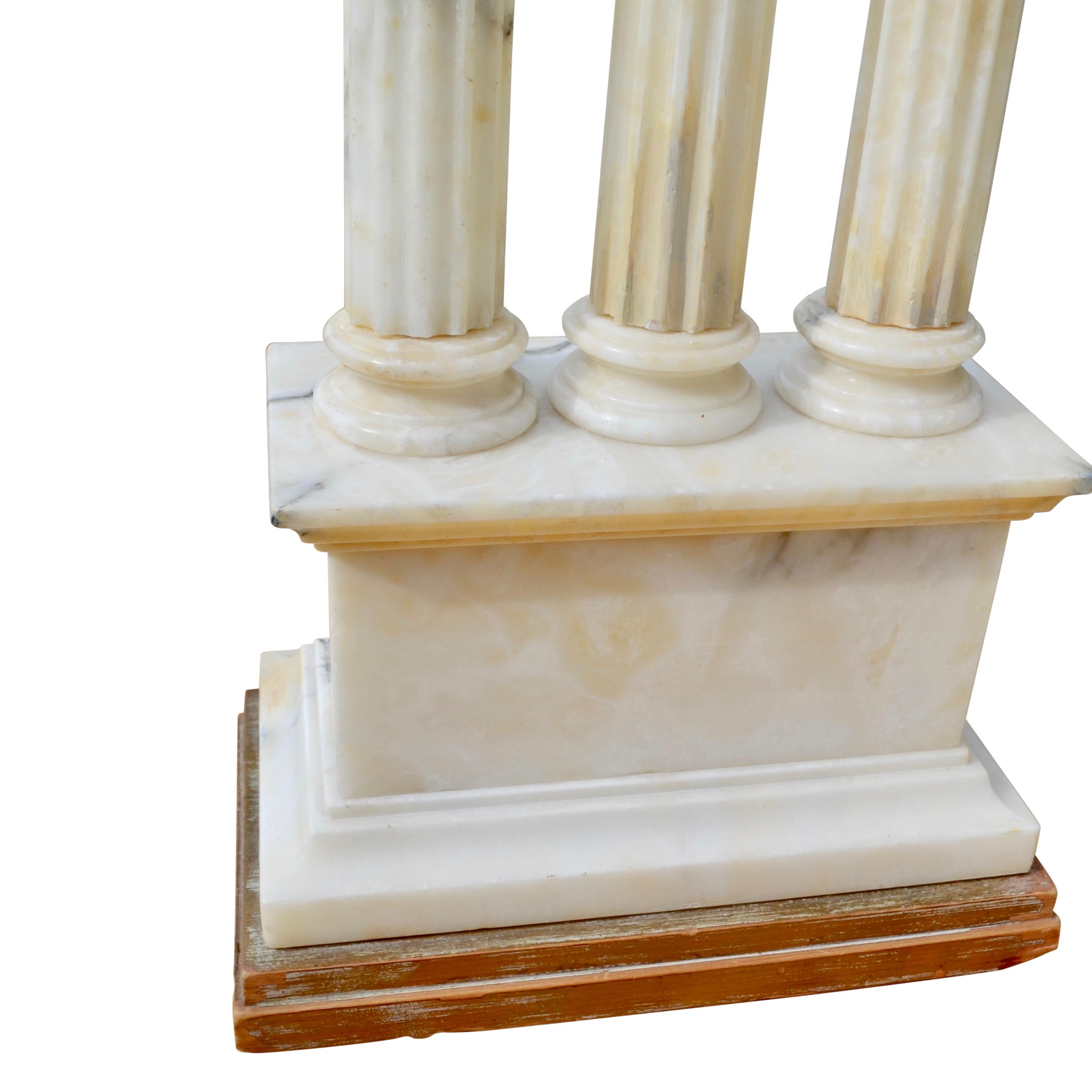 20th Century Carved White Alabaster Lamps Modelled After Roman Temple Ruins For Sale