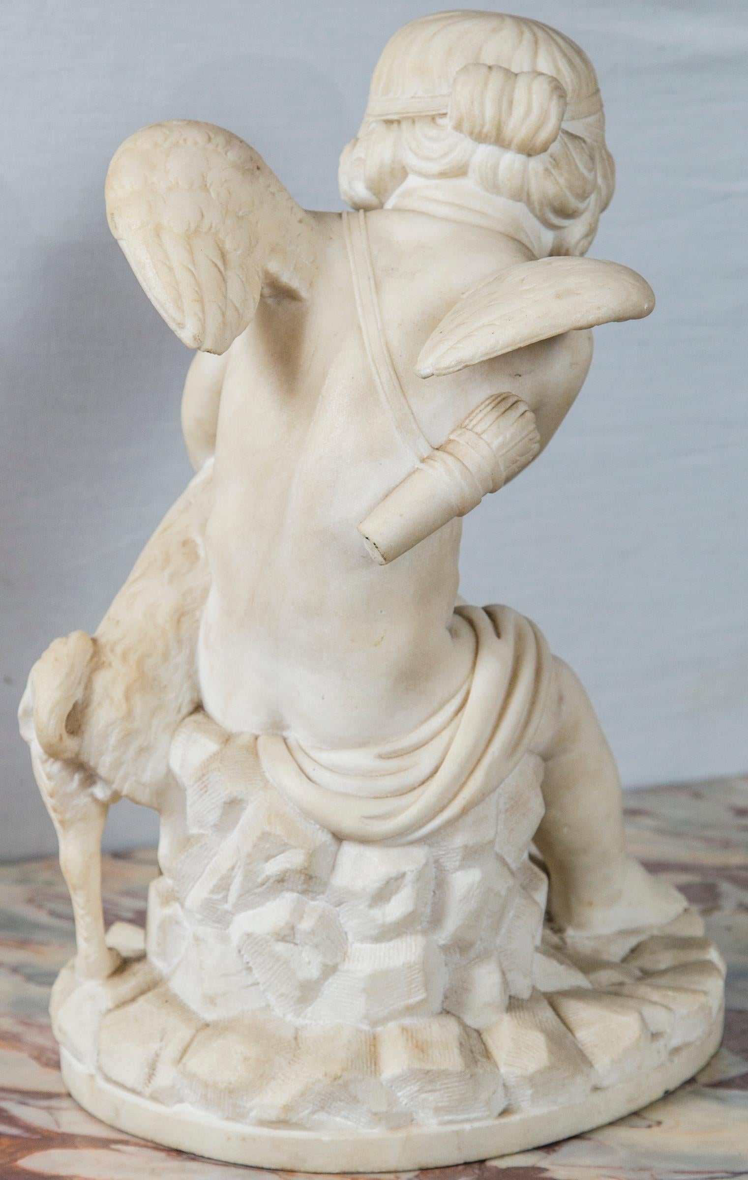 Carved White Marble Cupid and Dog In Good Condition In Woodbury, CT
