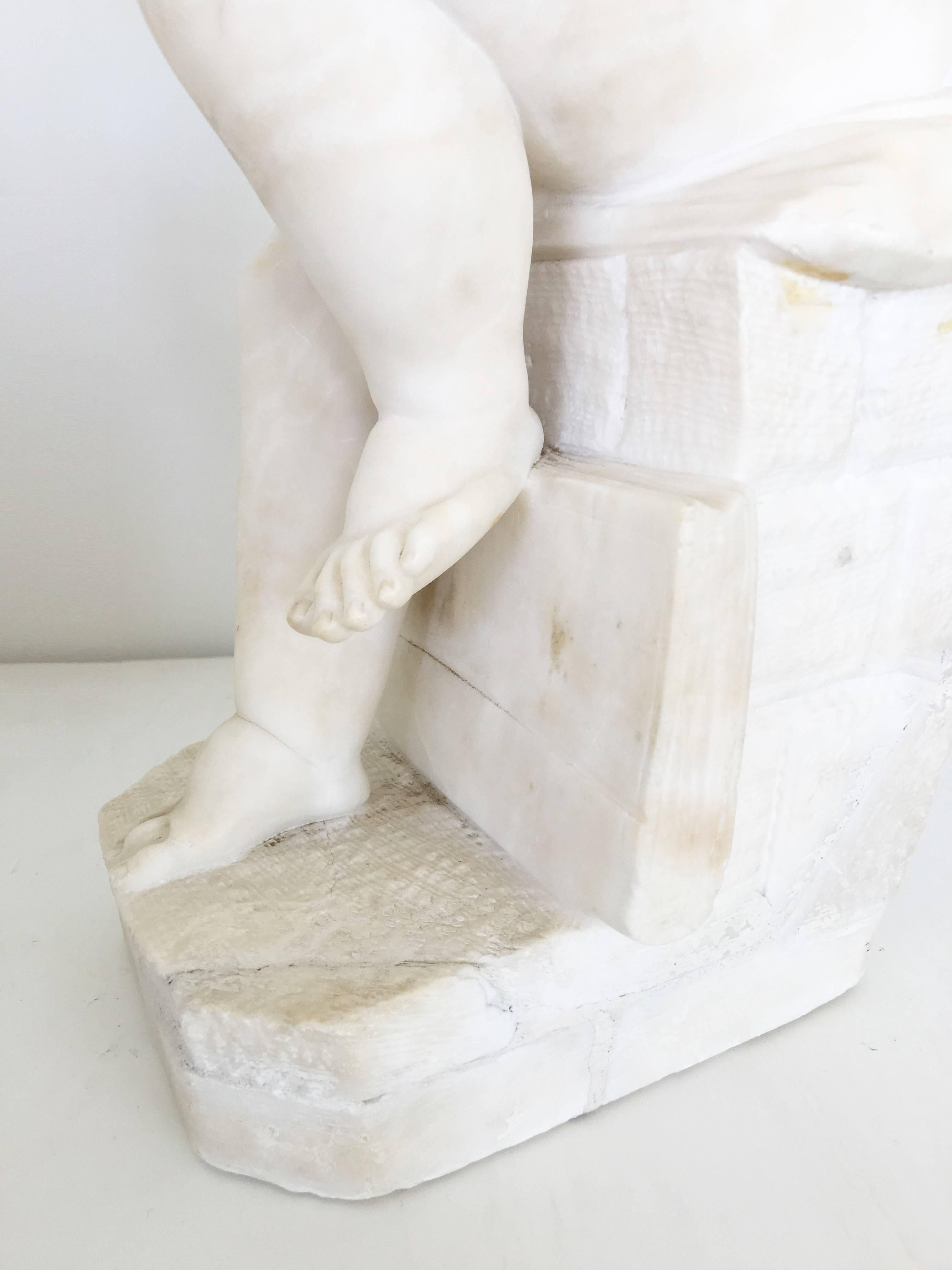 Carved White Marble Sculpture of a Child Writing For Sale 7