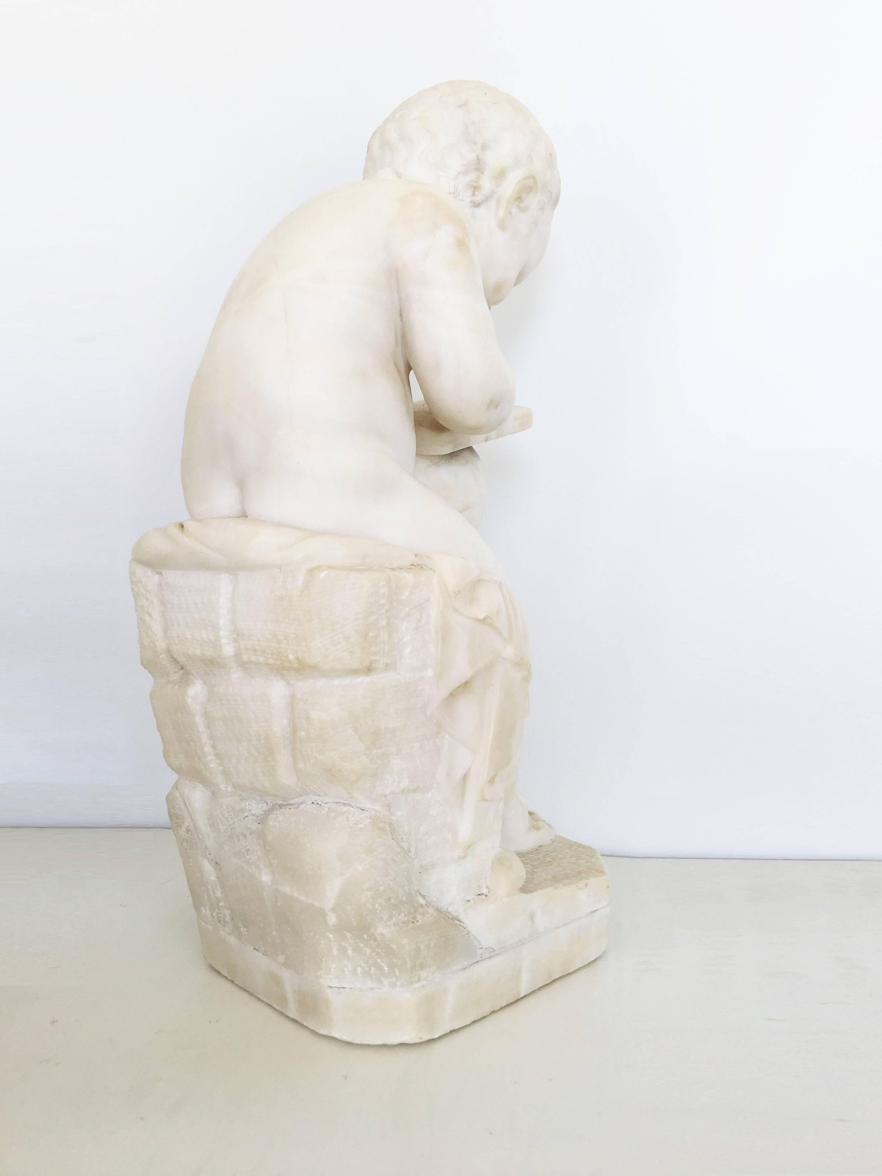 Carved White Marble Sculpture of a Child Writing For Sale 8