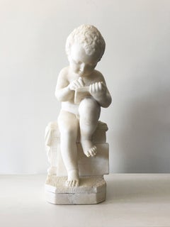 Carved White Marble Sculpture of a Child Writing