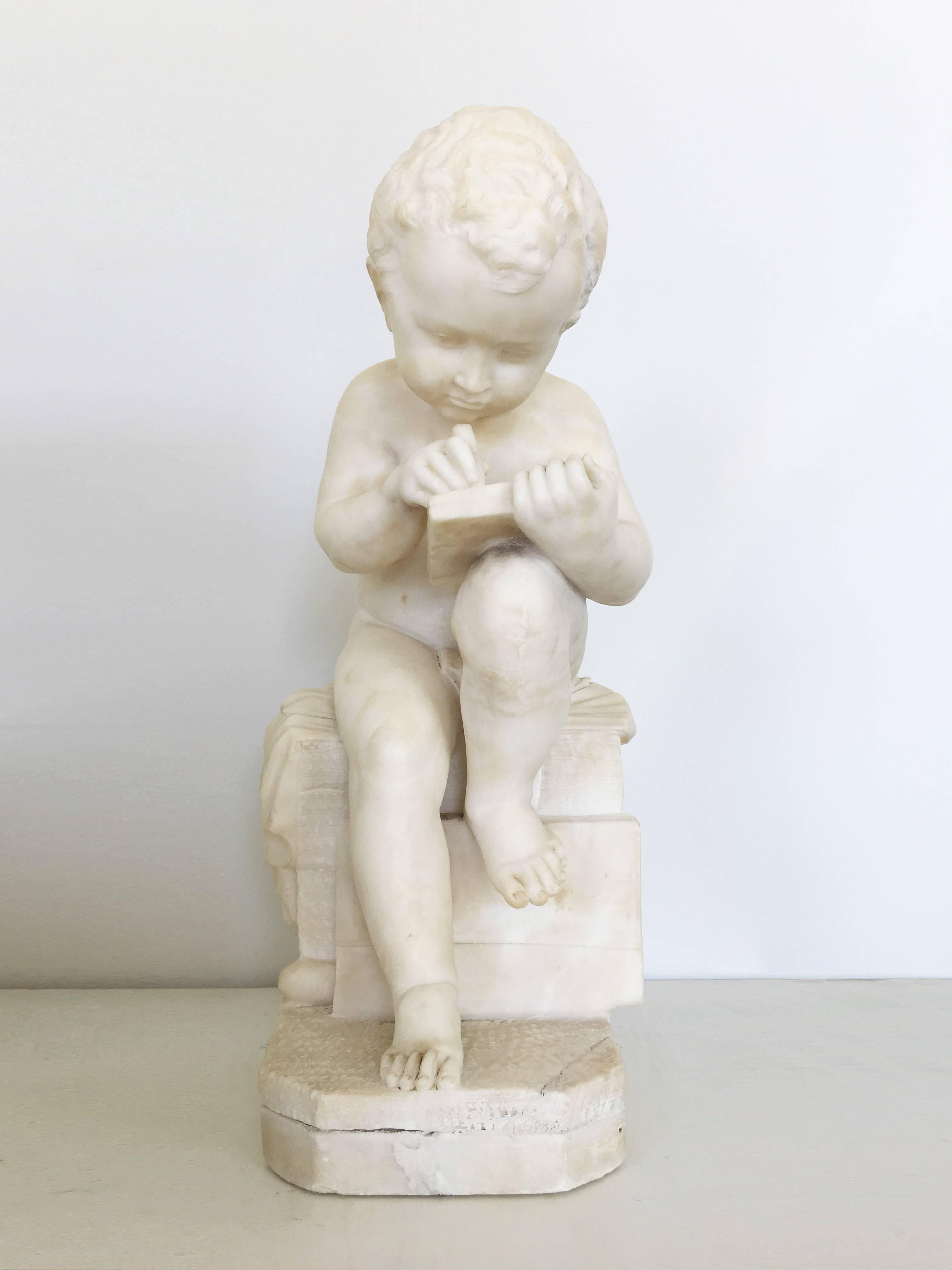 Neoclassical Carved White Marble Sculpture of a Child Writing For Sale