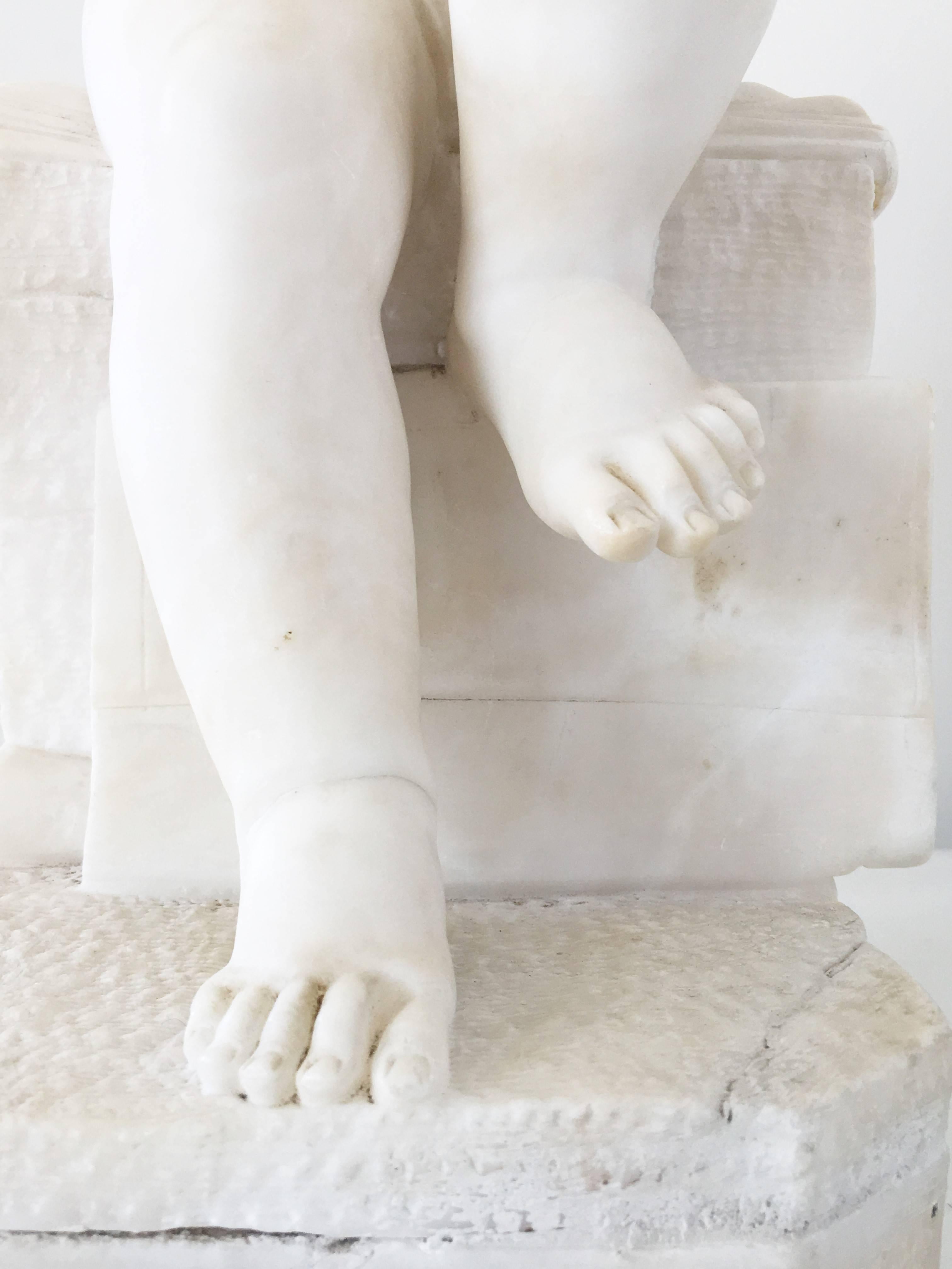 19th Century Carved White Marble Sculpture of a Child Writing For Sale