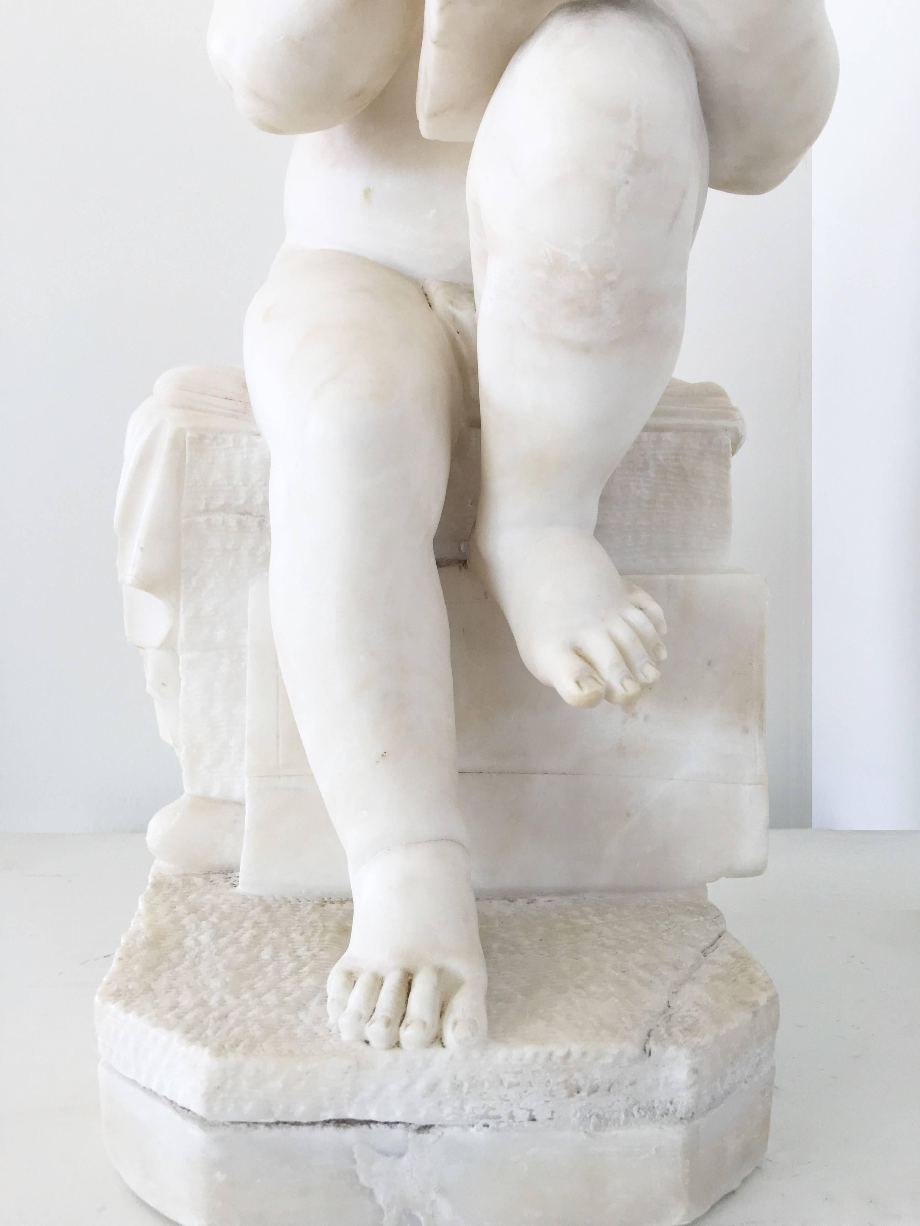 Carved White Marble Sculpture of a Child Writing For Sale 1